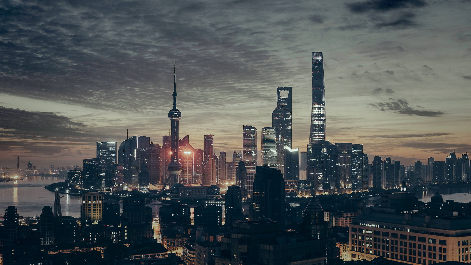 The Skyline Of Shanghai At Dusk Background