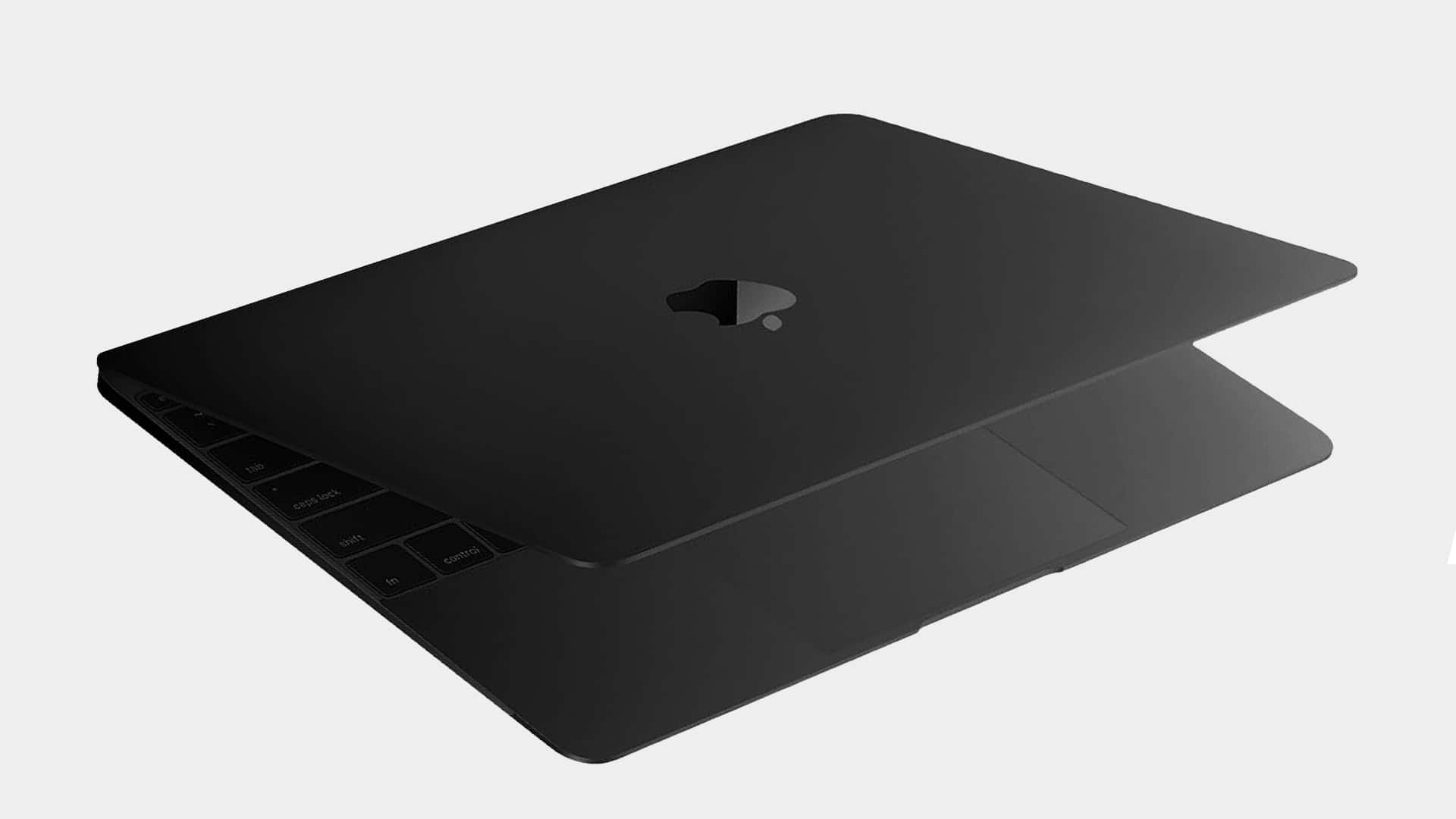 The Sleek And Stylish Black Macbook. Background