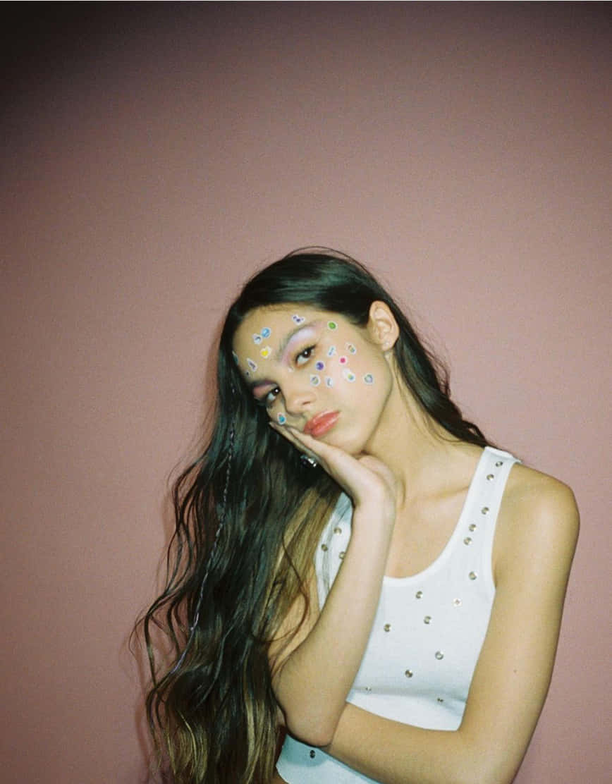 The Soulful Aesthetic Of Olivia Rodrigo Background