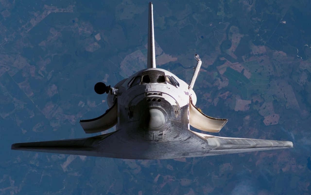 The Space Shuttle In Earth's Orbit