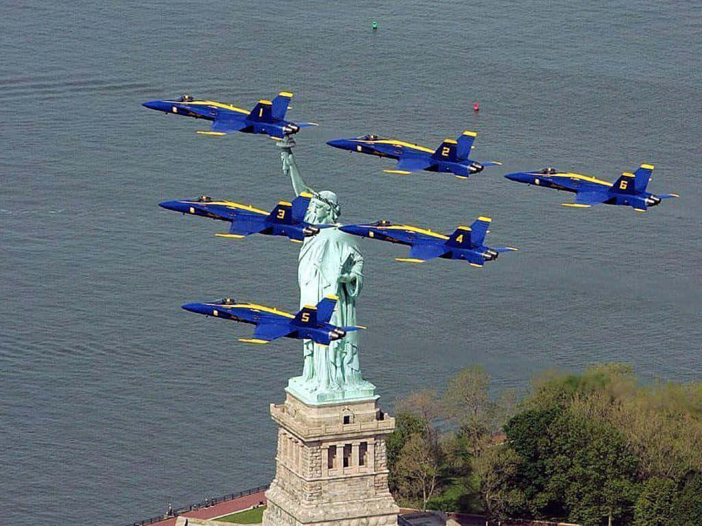 The Statue Of Liberty Is In The Water Background