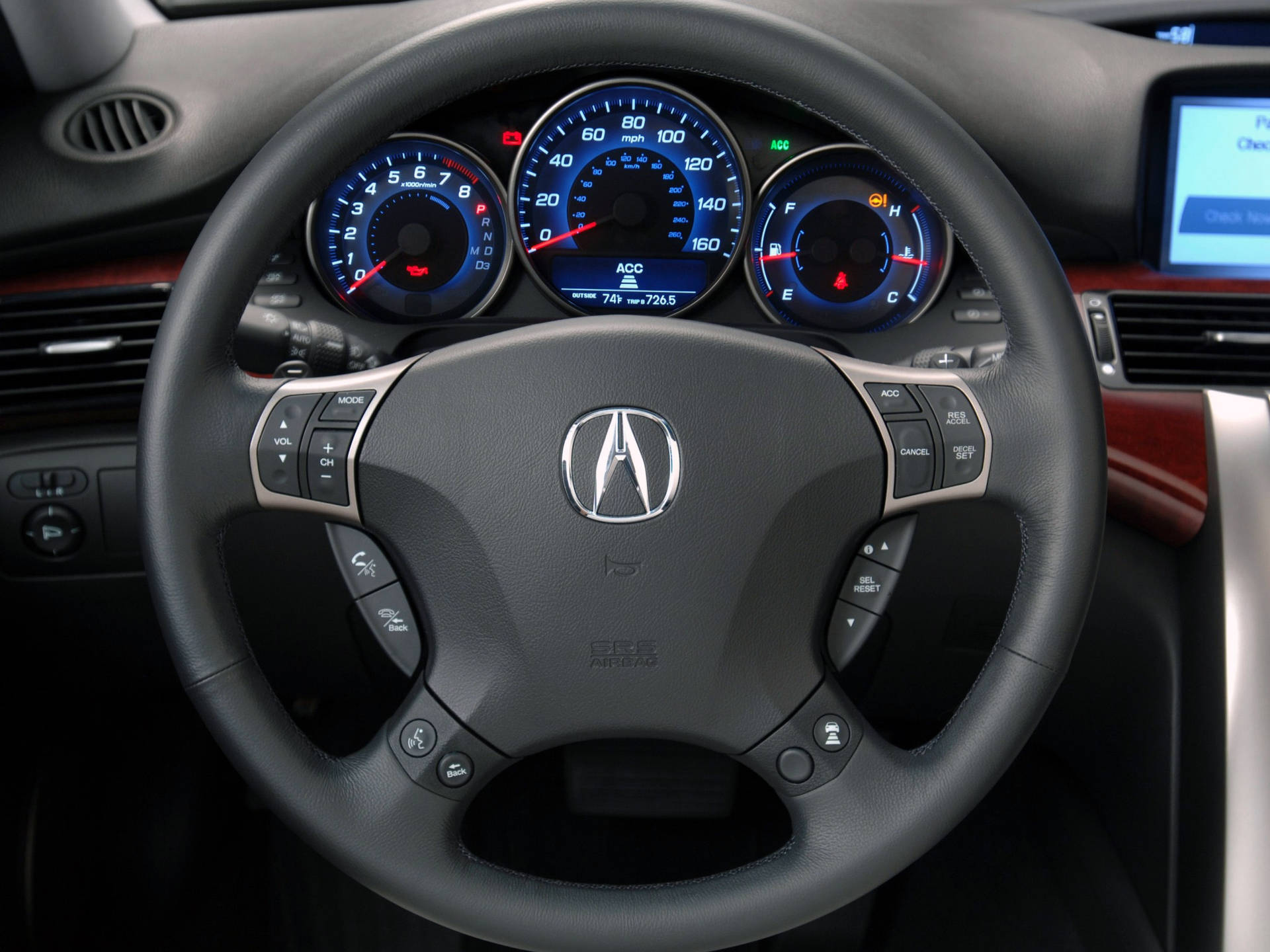 The Steering Wheel And Dashboard Of A Car Background
