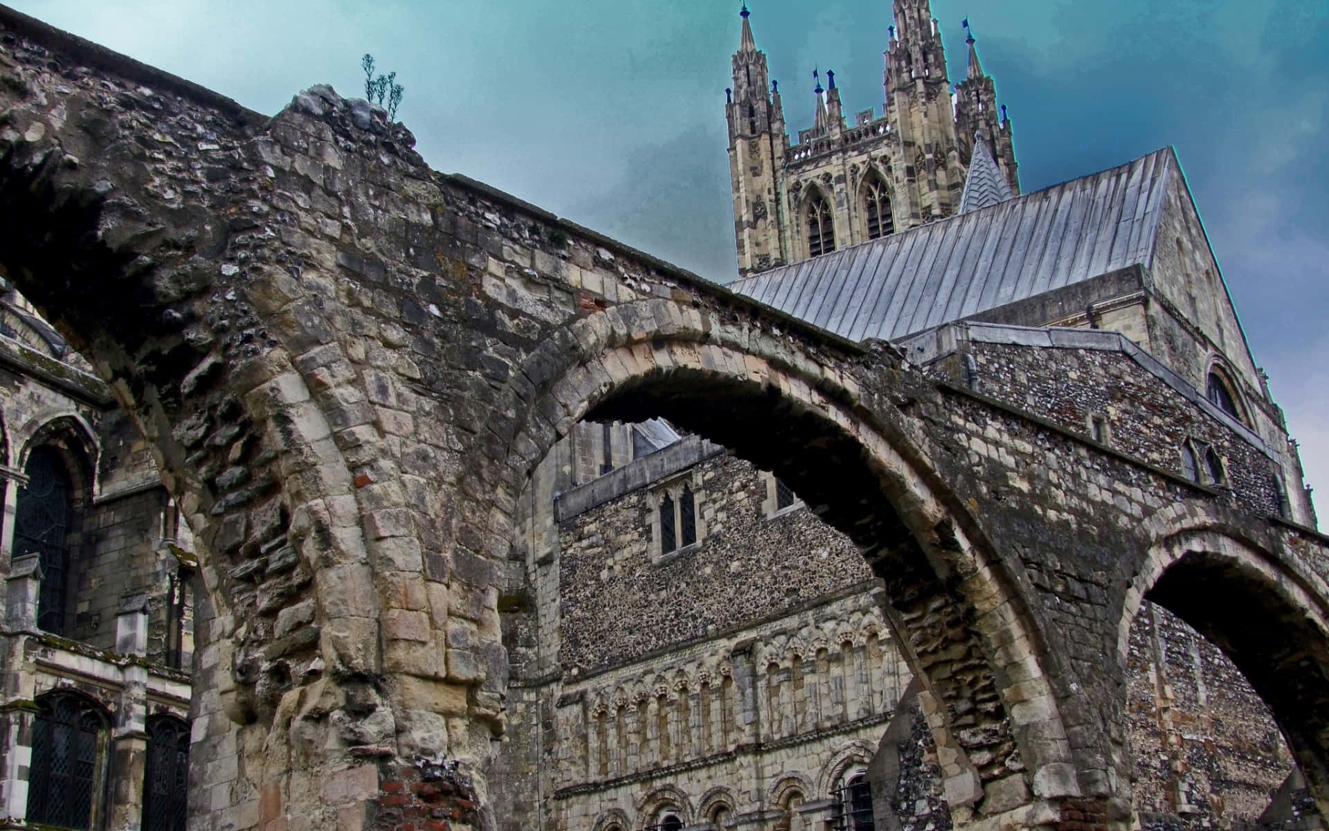 The Stoned Arches Outside Canterbury Cathedral Background
