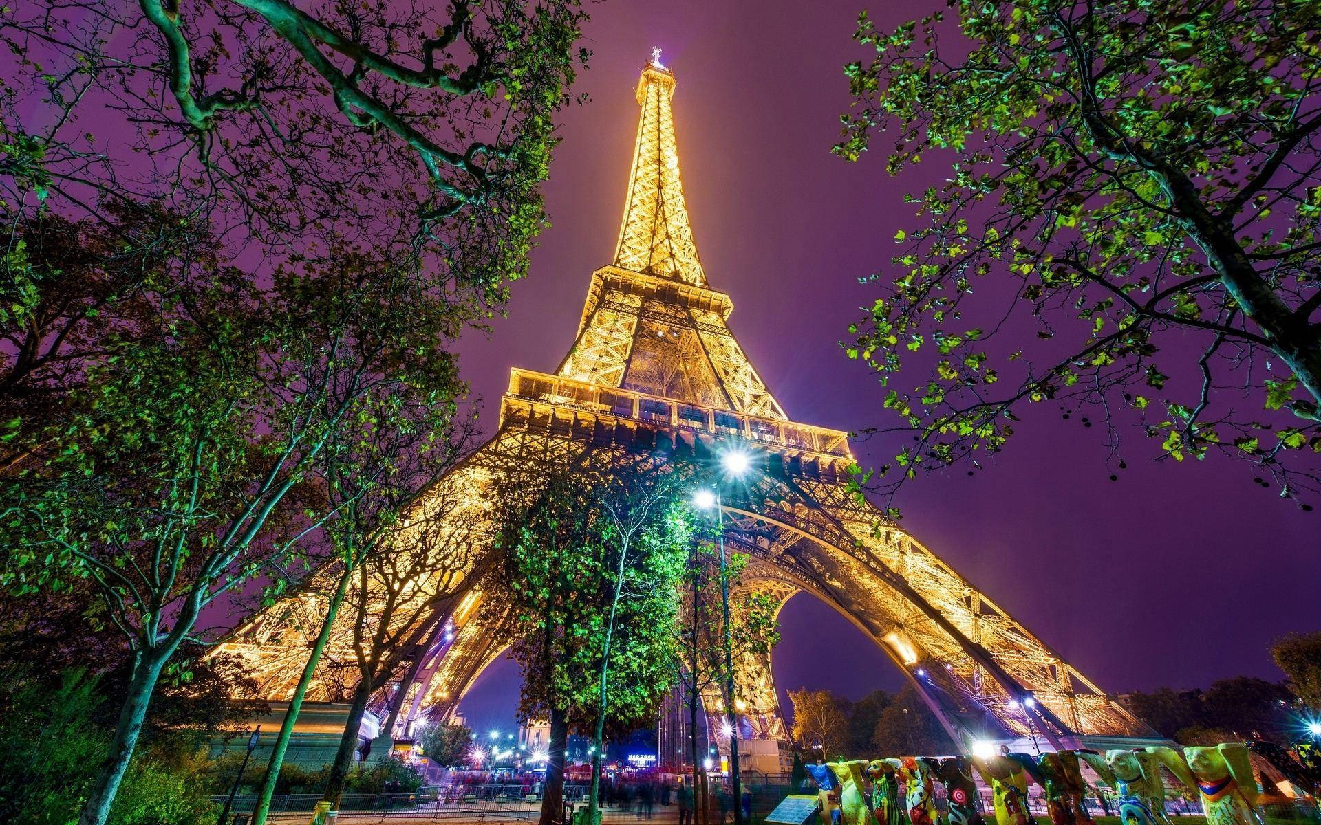 The Stunning Eiffel Tower At Sunset In Paris, France