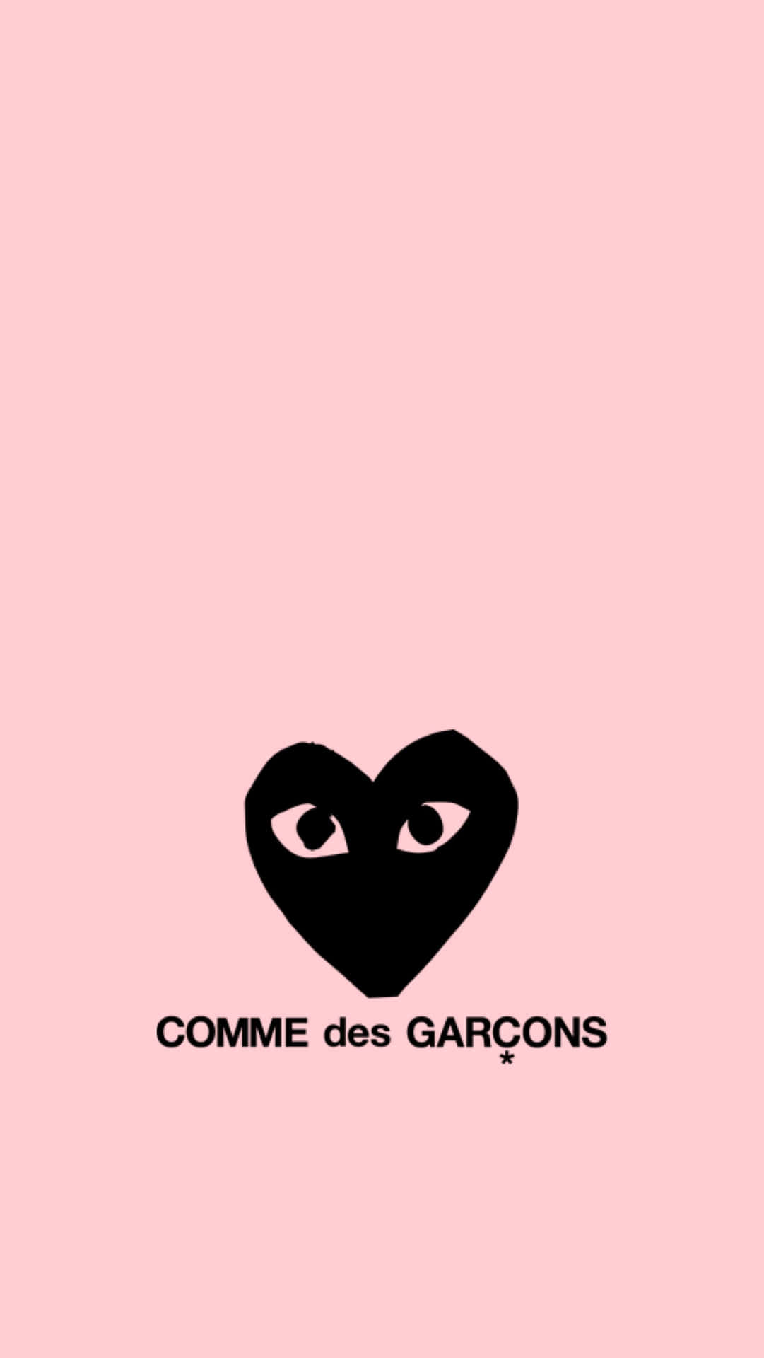 The Stylish Streetwear Of Cdg Play Is Perfect For Any Occasion. Background