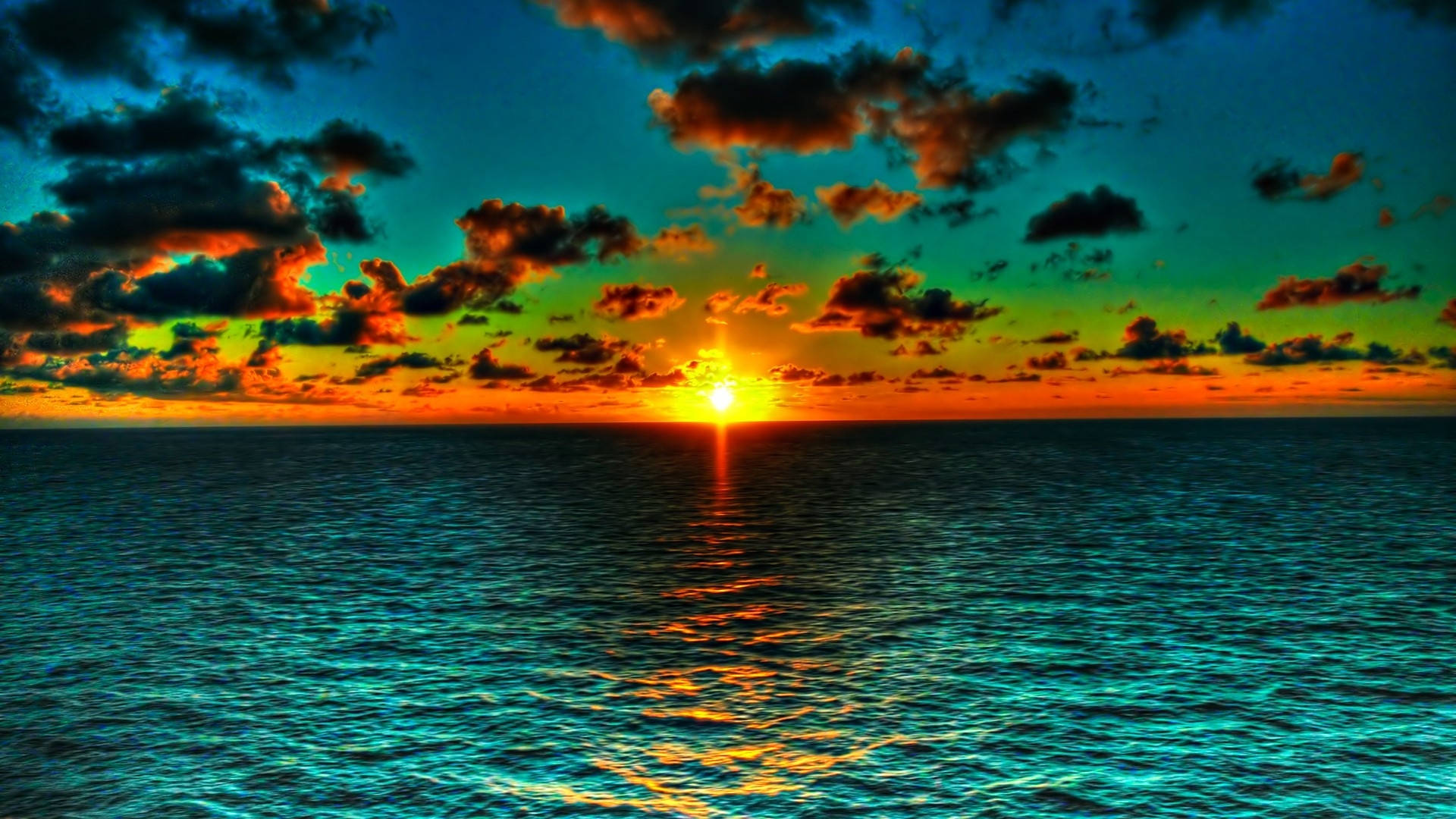 The Sun Is Setting Over The Ocean Background