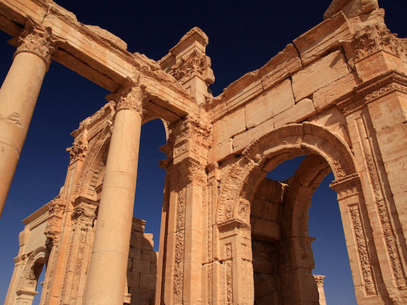 The Tall Sandstone Pillars In Palmyra Background