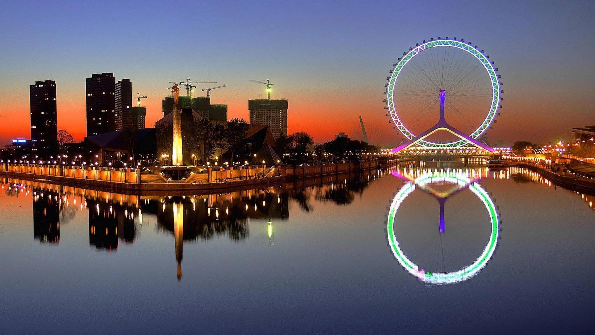 The Tianjin Eye At Sunset Background
