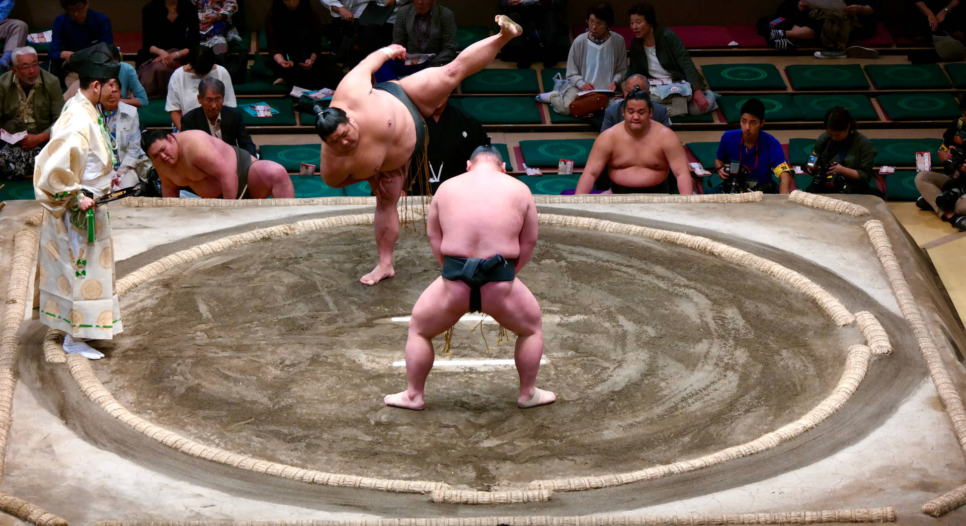 The Tradition Of Sumo Wrestling Remains Strong In Japan Background