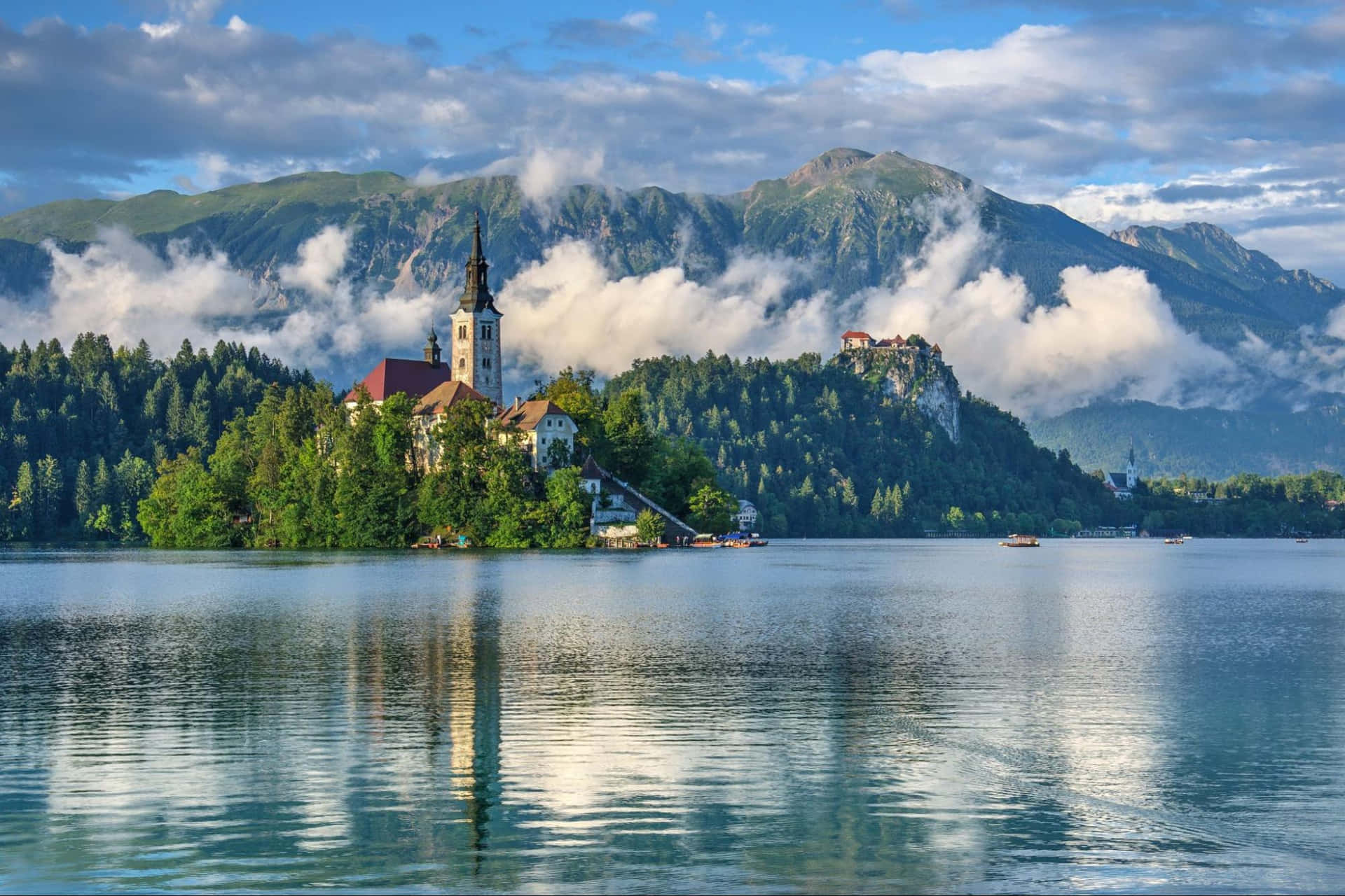 The Turret Of The Church In Lake Bled