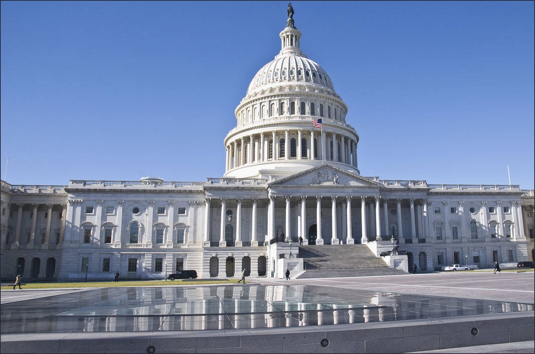 The United States Capitol Building At Dusk Background