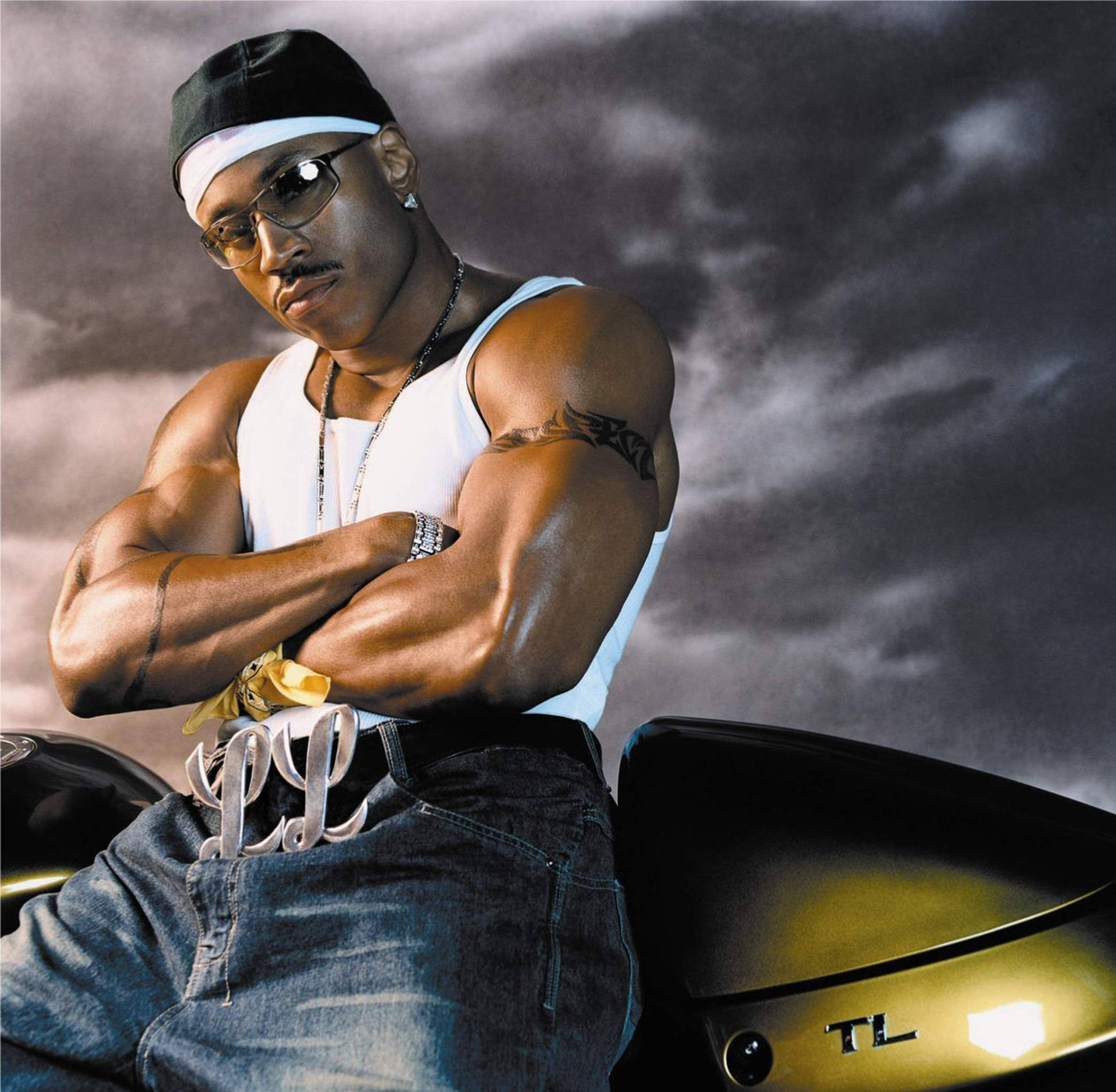 The Versatile Rapper Ll Cool J In Dynamic Action. Background