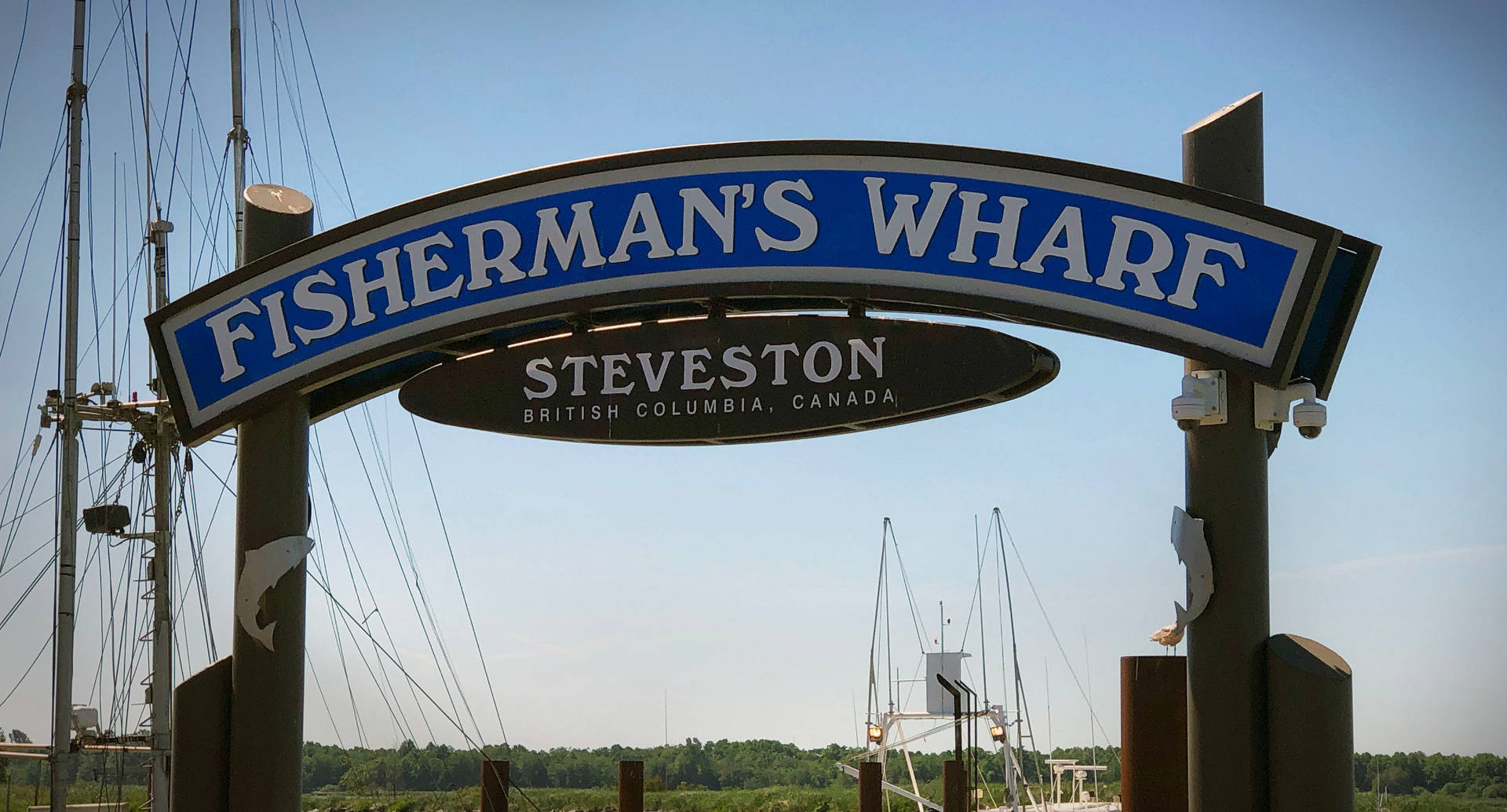 The Vibrant Entrance To Fisherman's Wharf In Steveston Background