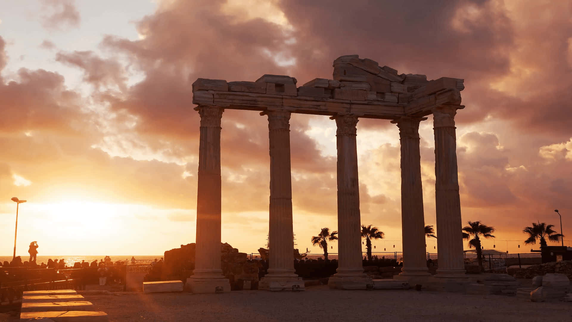 The View Of Temple Of Apollo With Sunset Background