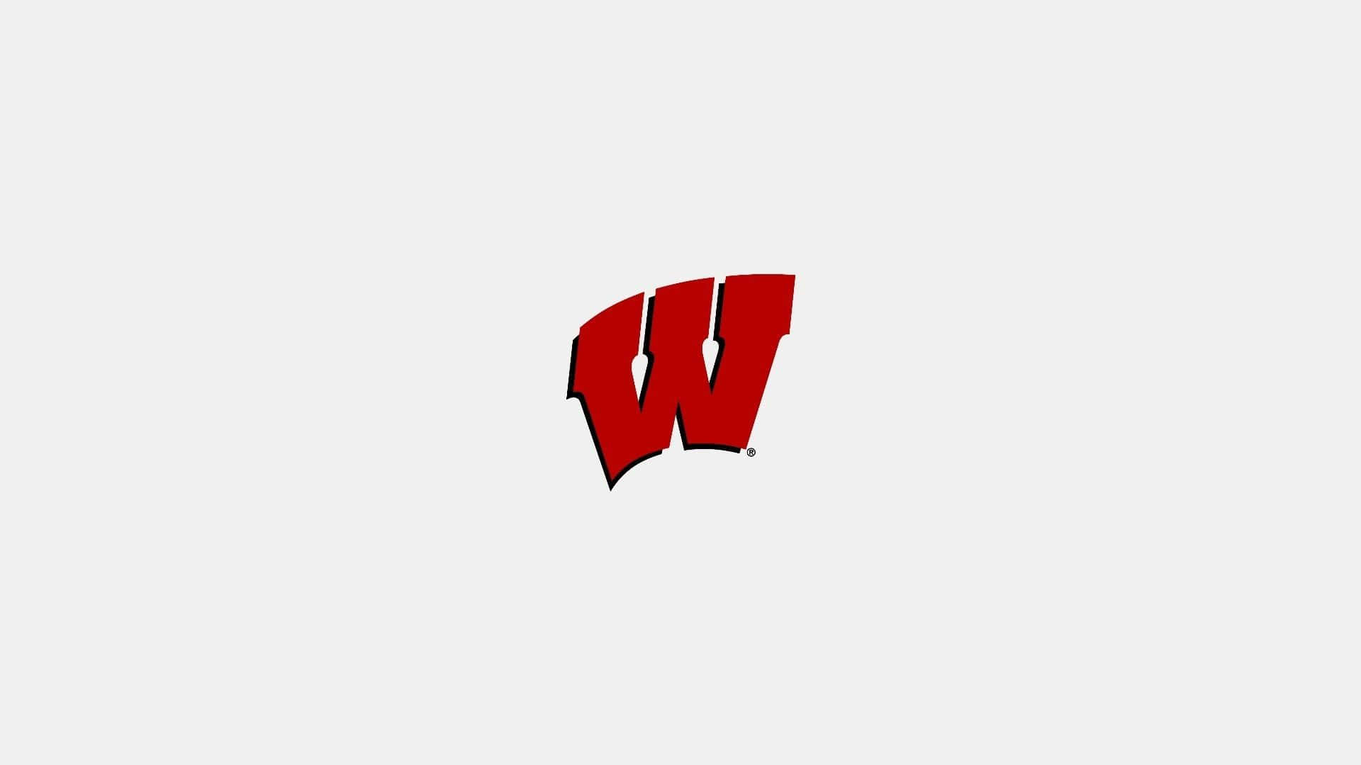 The Wisconsin Badgers Football Team In Action On The Field Background