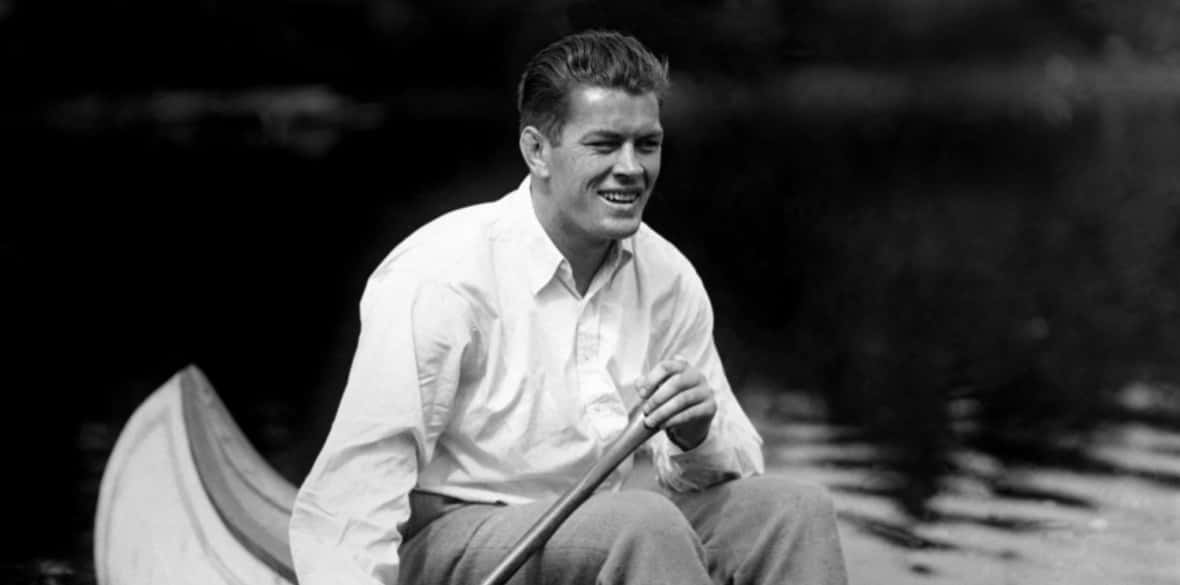 The Young Gene Tunney Sailing A Boat