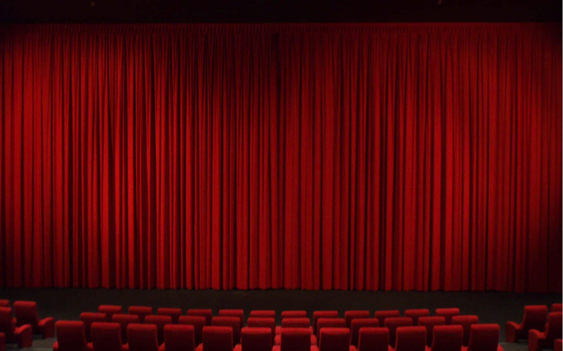 Theater With Long Red Curtains