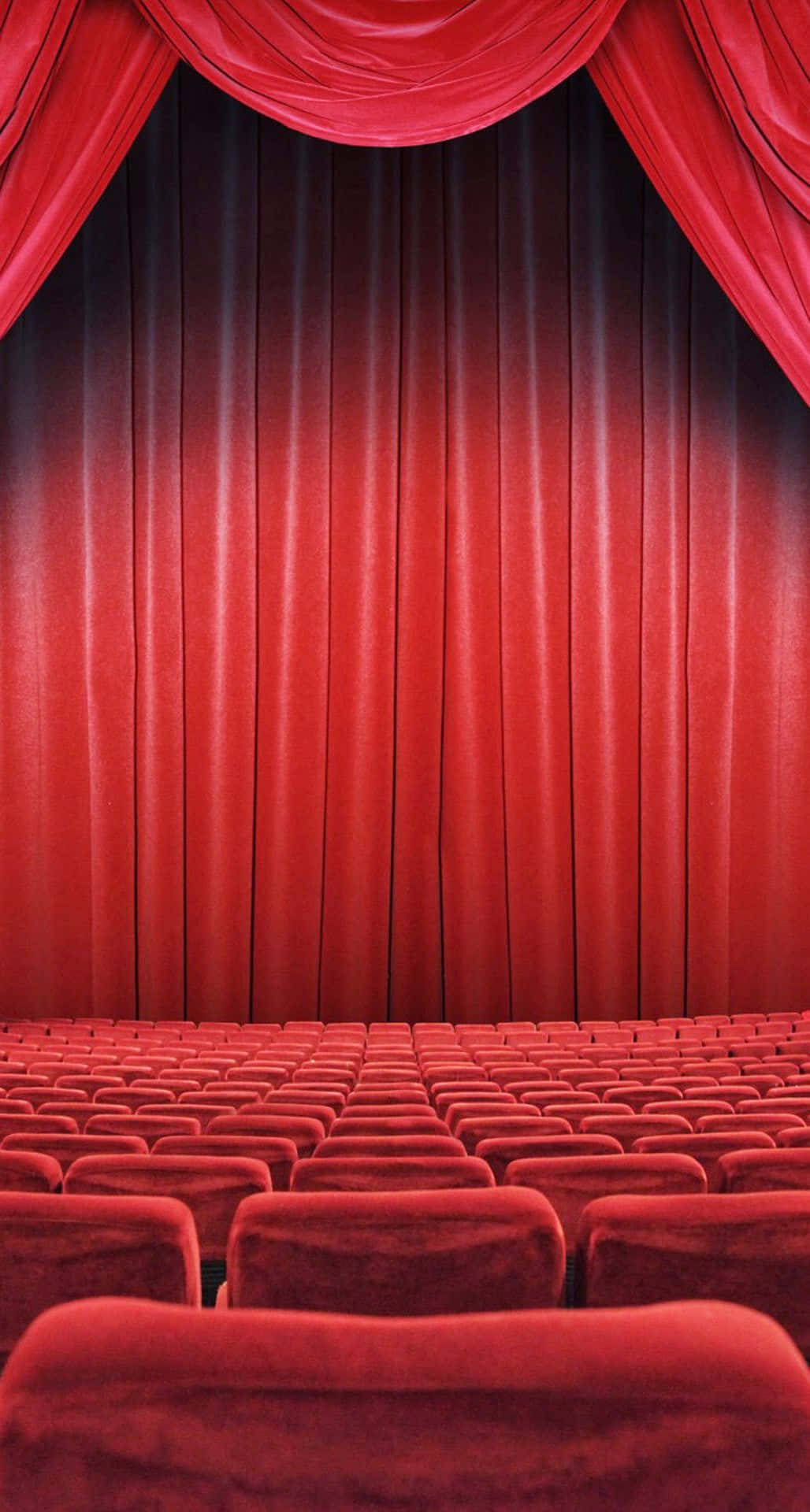 Theater With Red Seats And Curtains