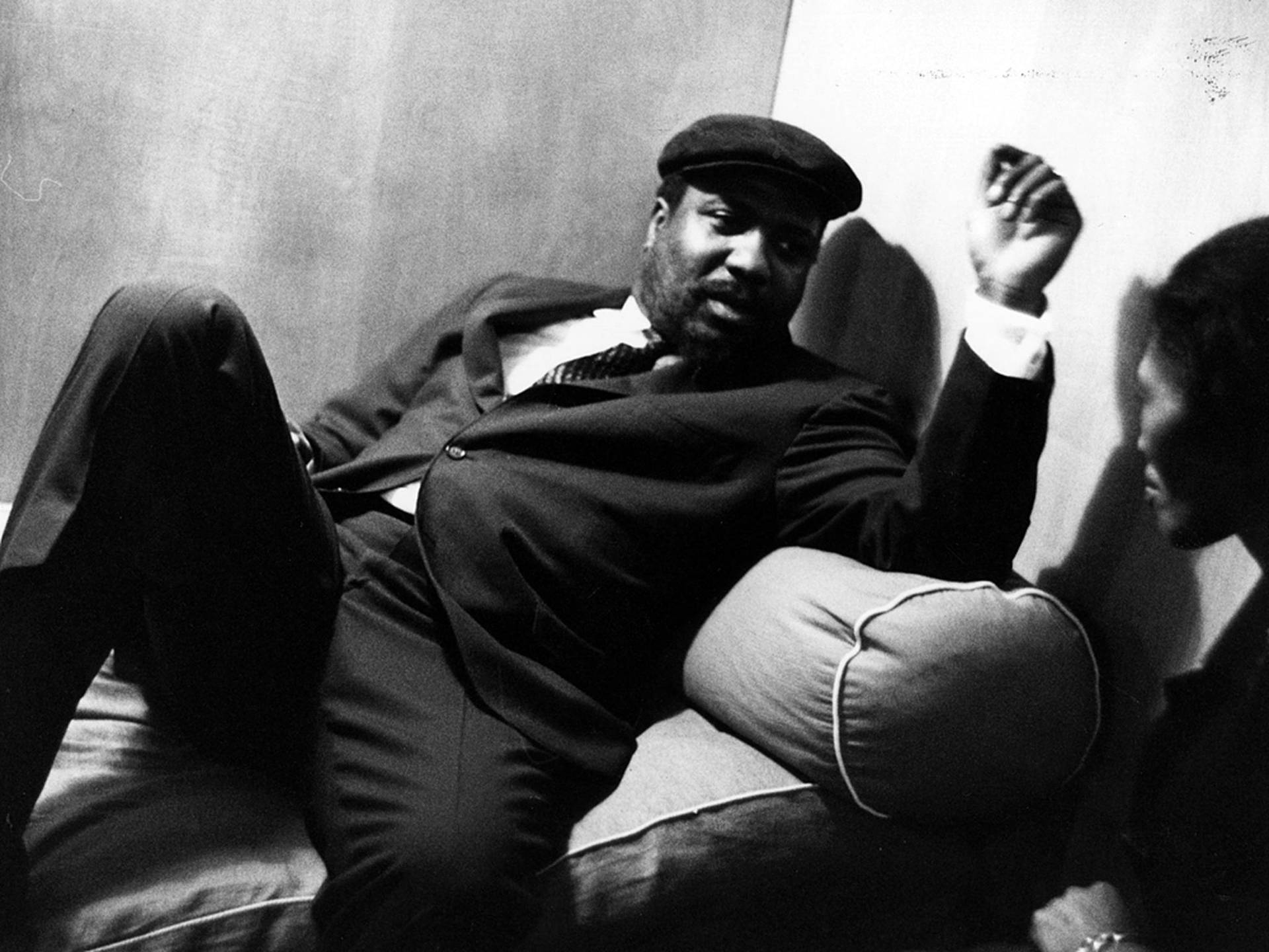 Thelonious Monk Chill On His Couch Background