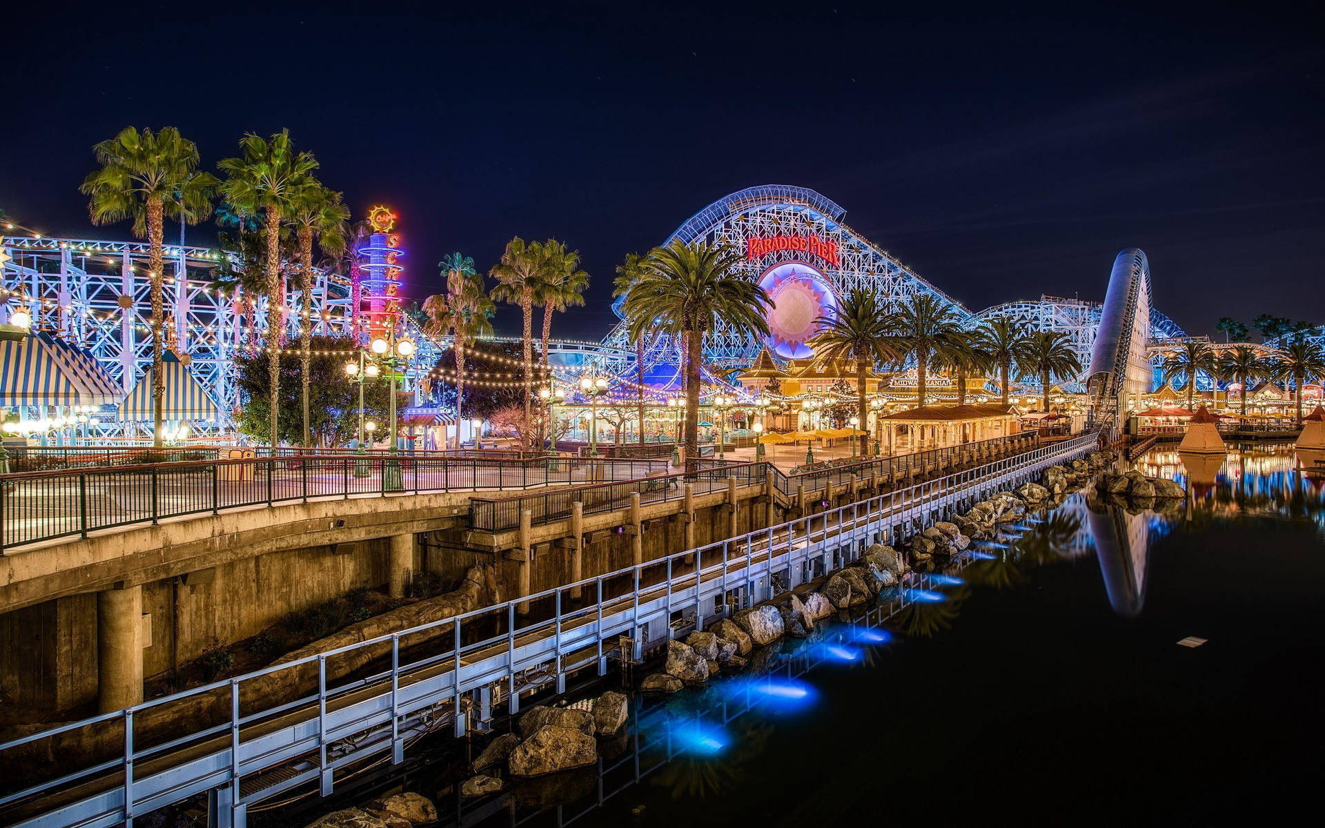 Theme Park Near The Pier Background