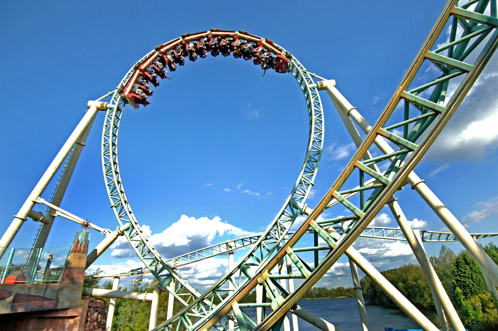 Theme Park Roller Coaster Loop Background