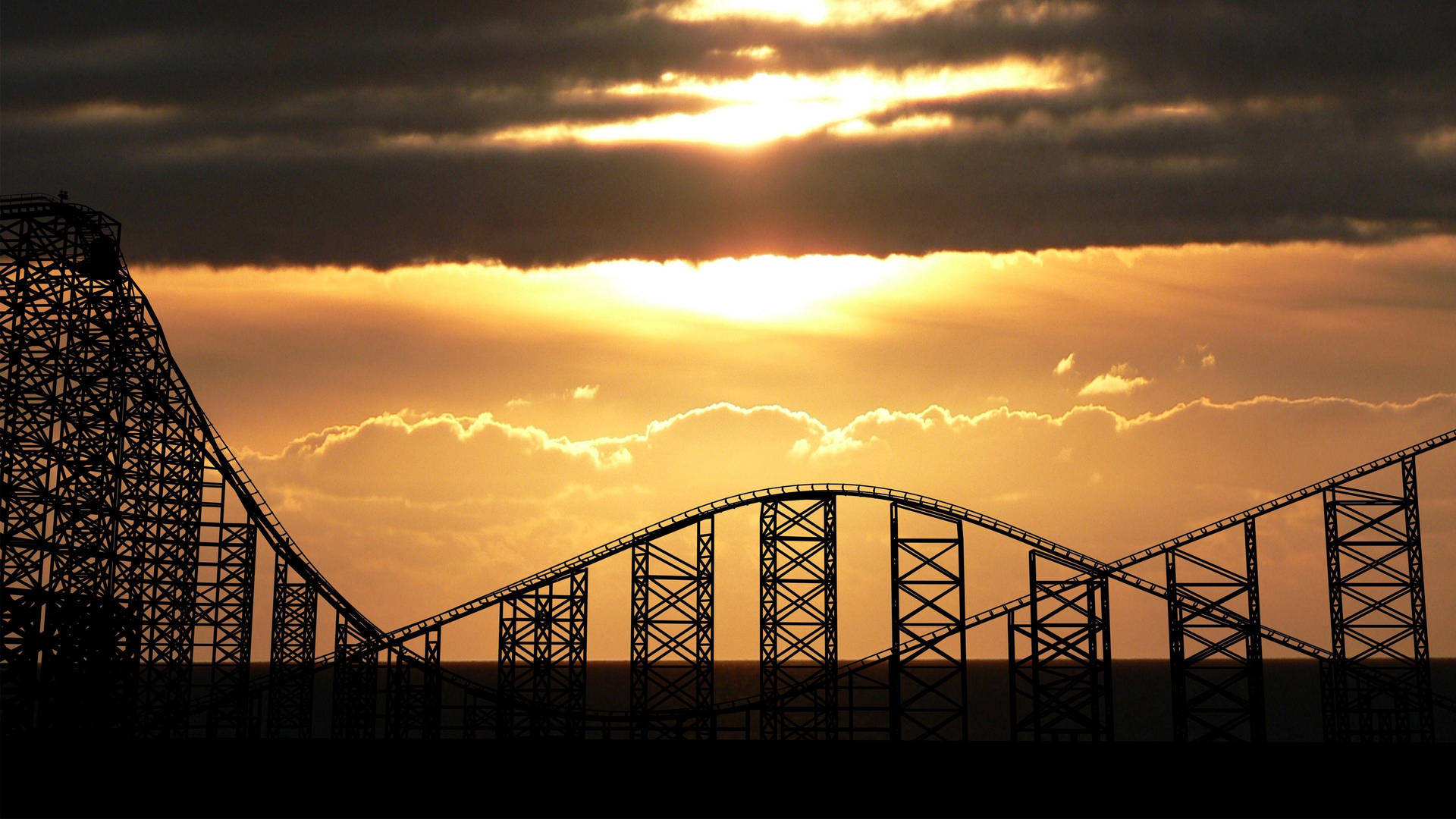 Theme Park Roller Coaster Tracks Background