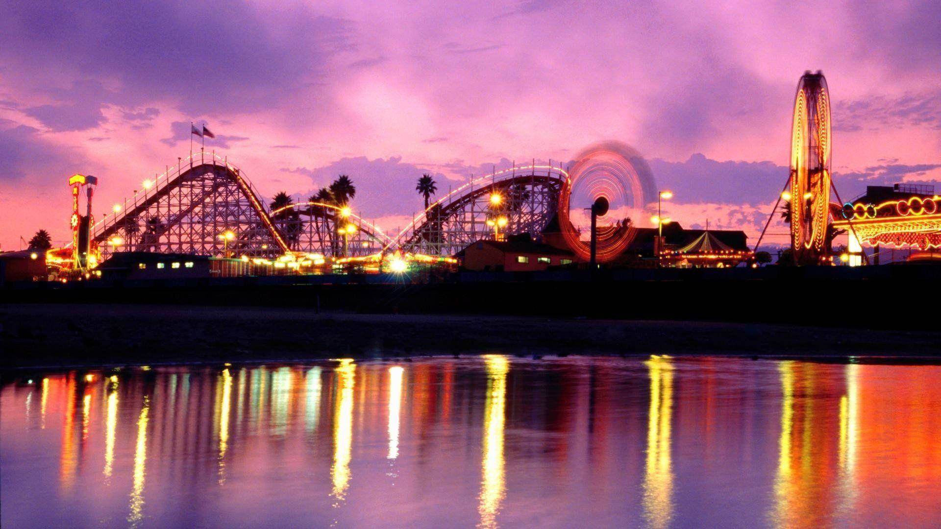 Theme Park Sunset Silhouette Background