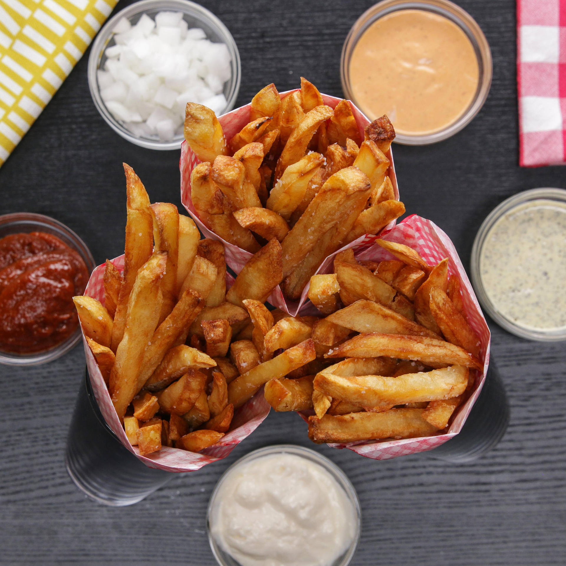 Thick French Fries And Sauces Background