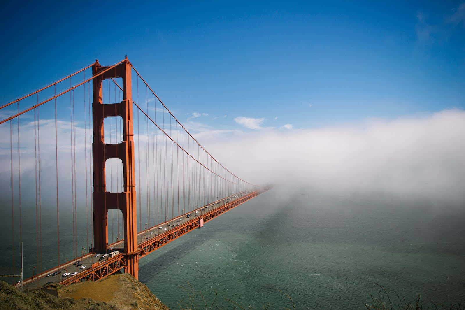 Thick San Francisco Fog Of Golden Gate Bridge Background