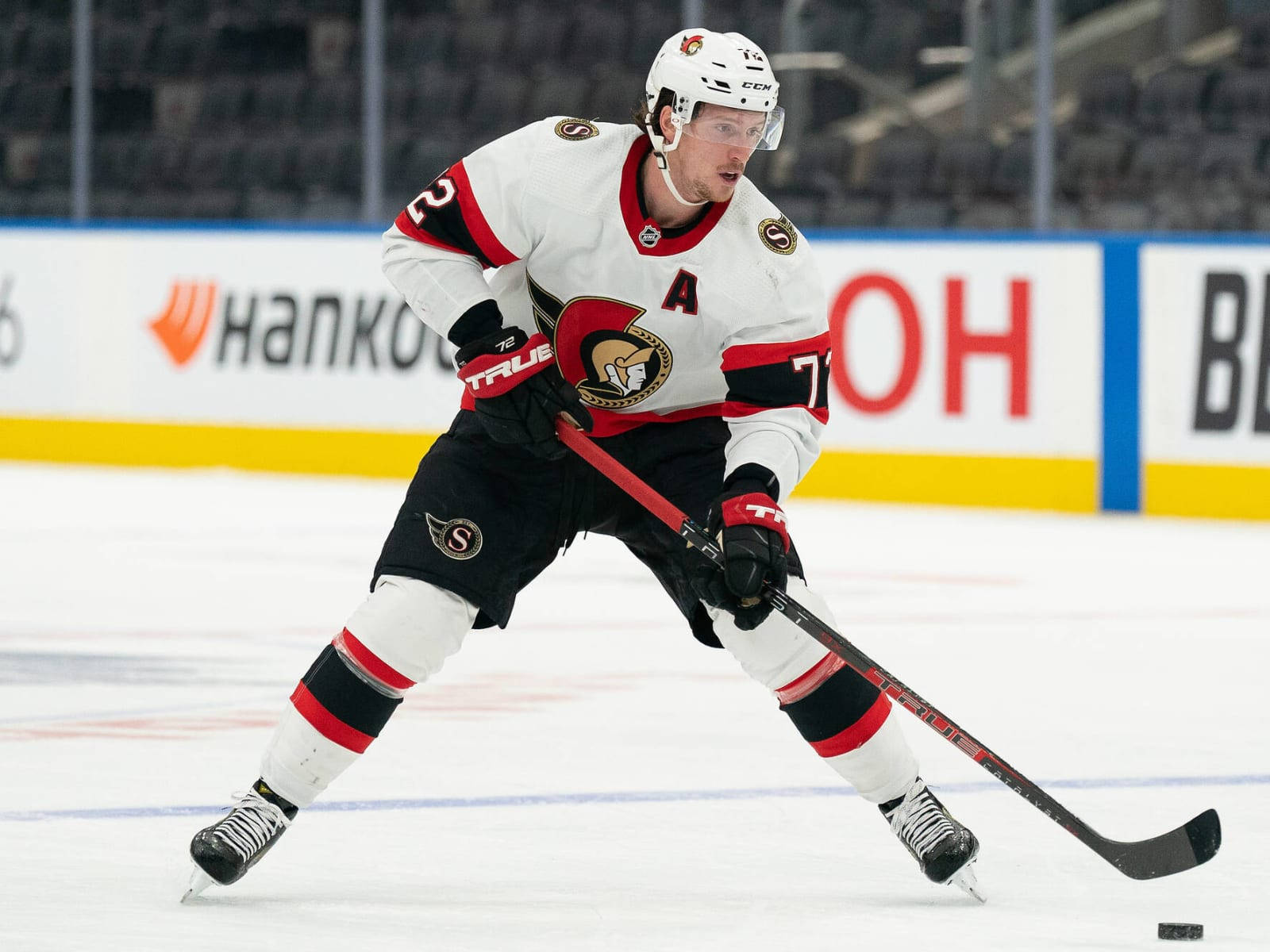 Thomas Chabot Stick And Puck Background