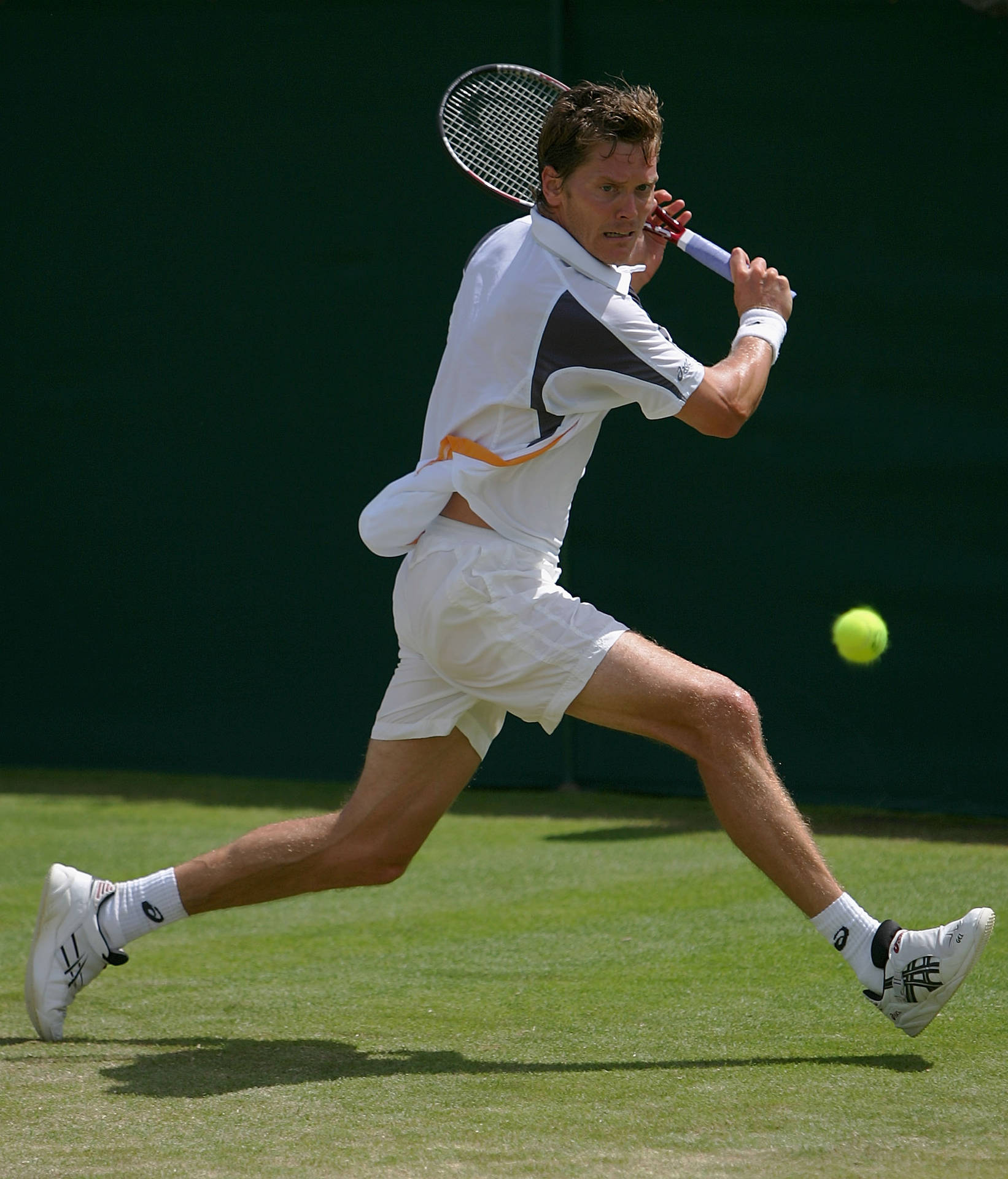 Thomas Enqvist Chasing A Ball Background