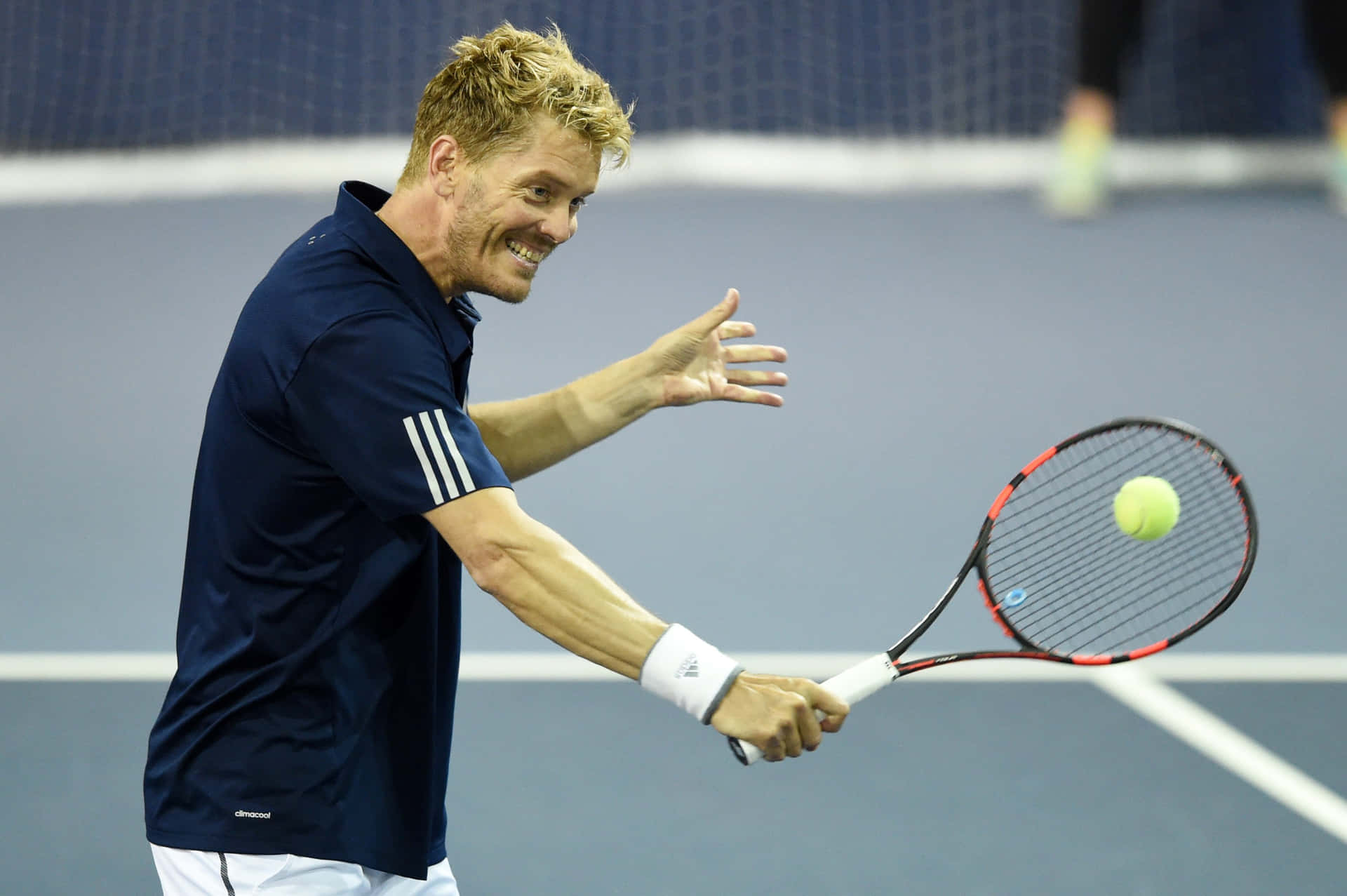 Thomas Enqvist Hitting Ball With Racket