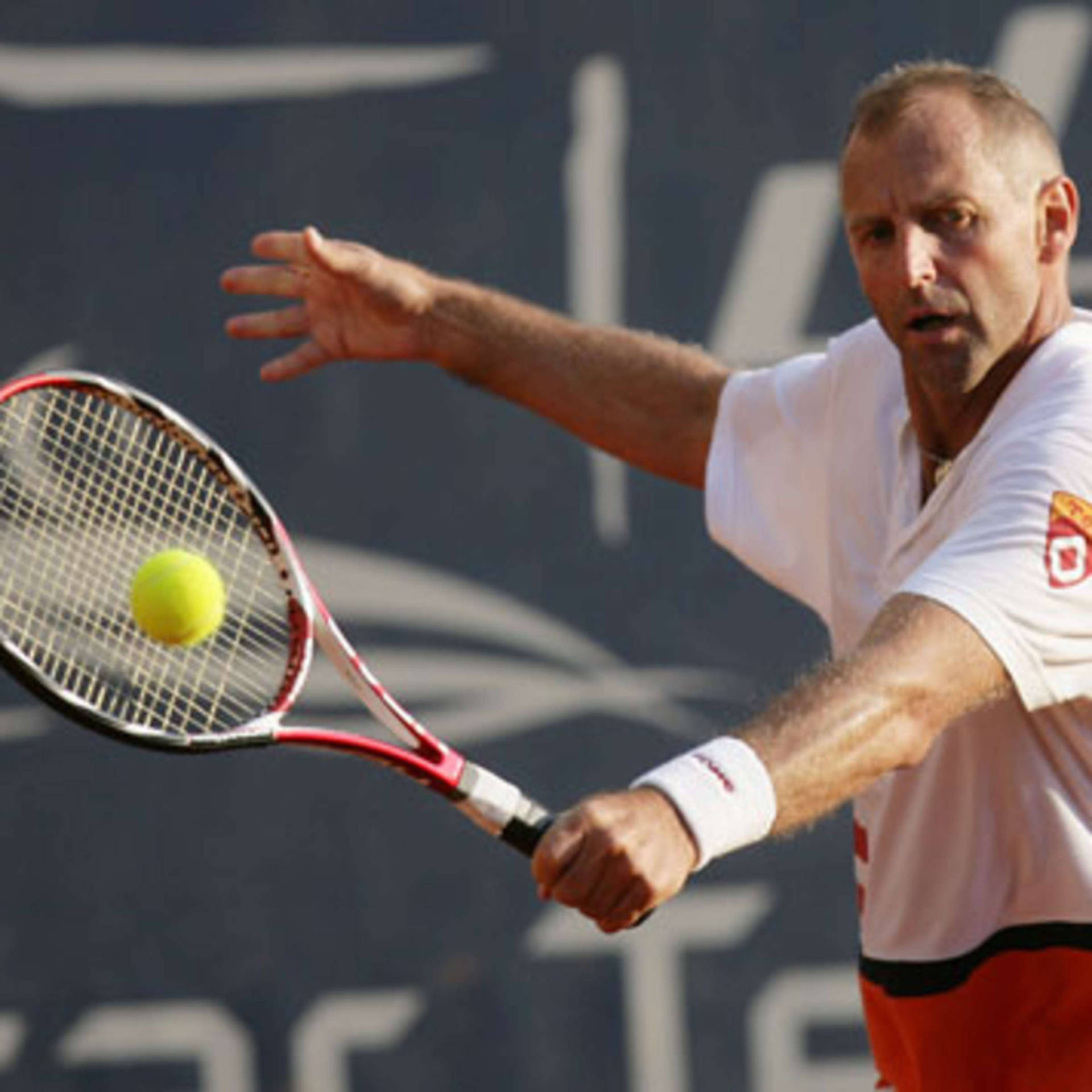 Thomas Muster Chasing Tennis Ball Background