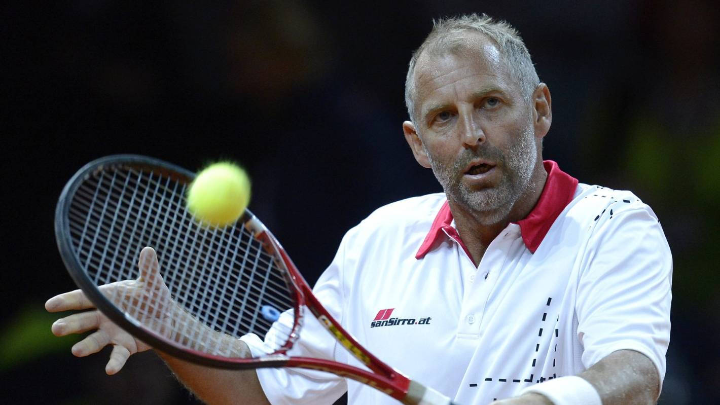 Thomas Muster Hitting Ball During Game Background