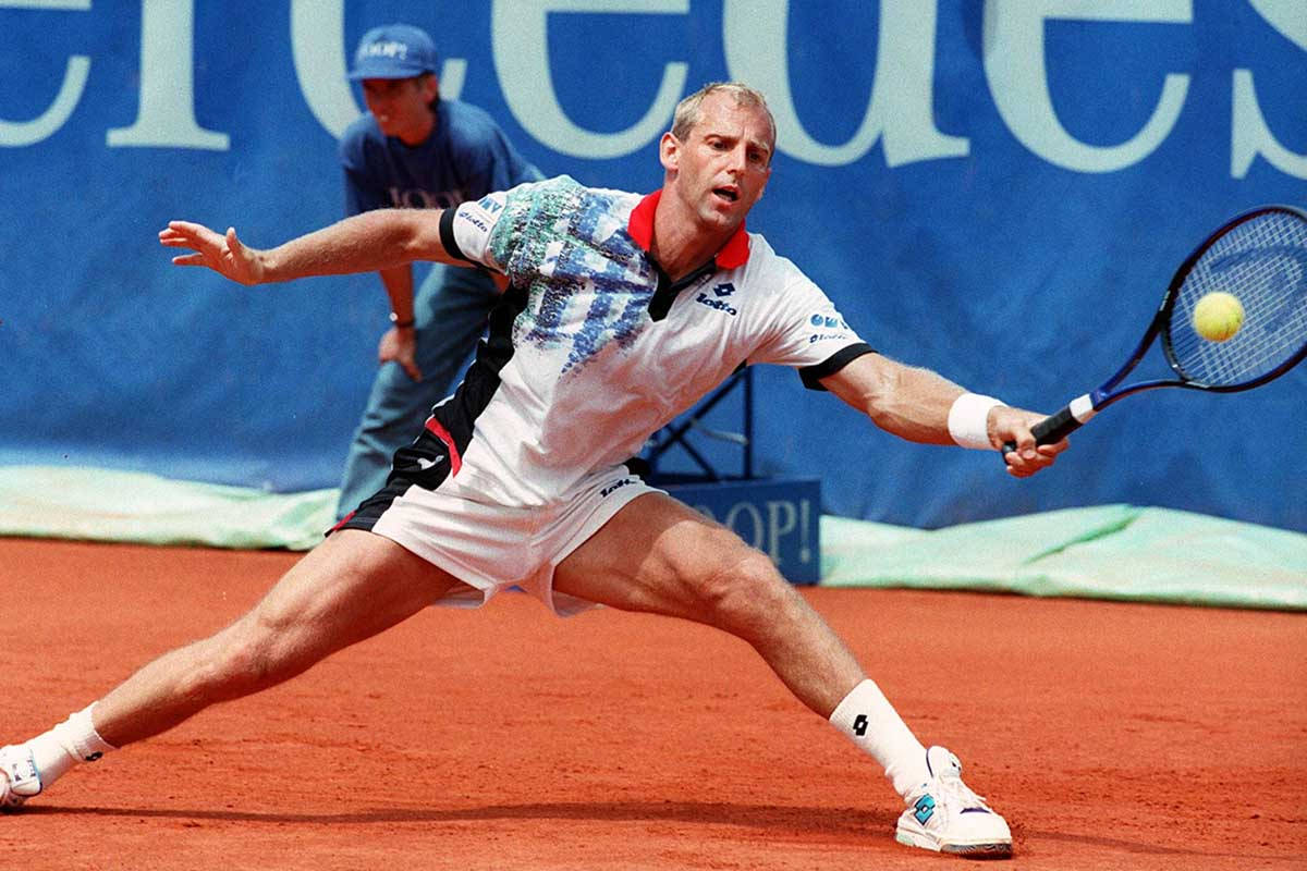 Thomas Muster Hitting Tennis Ball Background