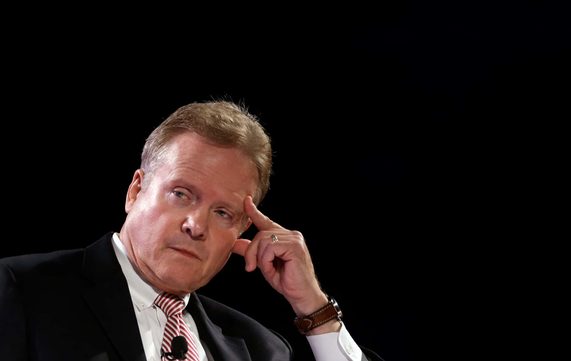 Thoughtful Jim Webb With Finger On Forehead Background