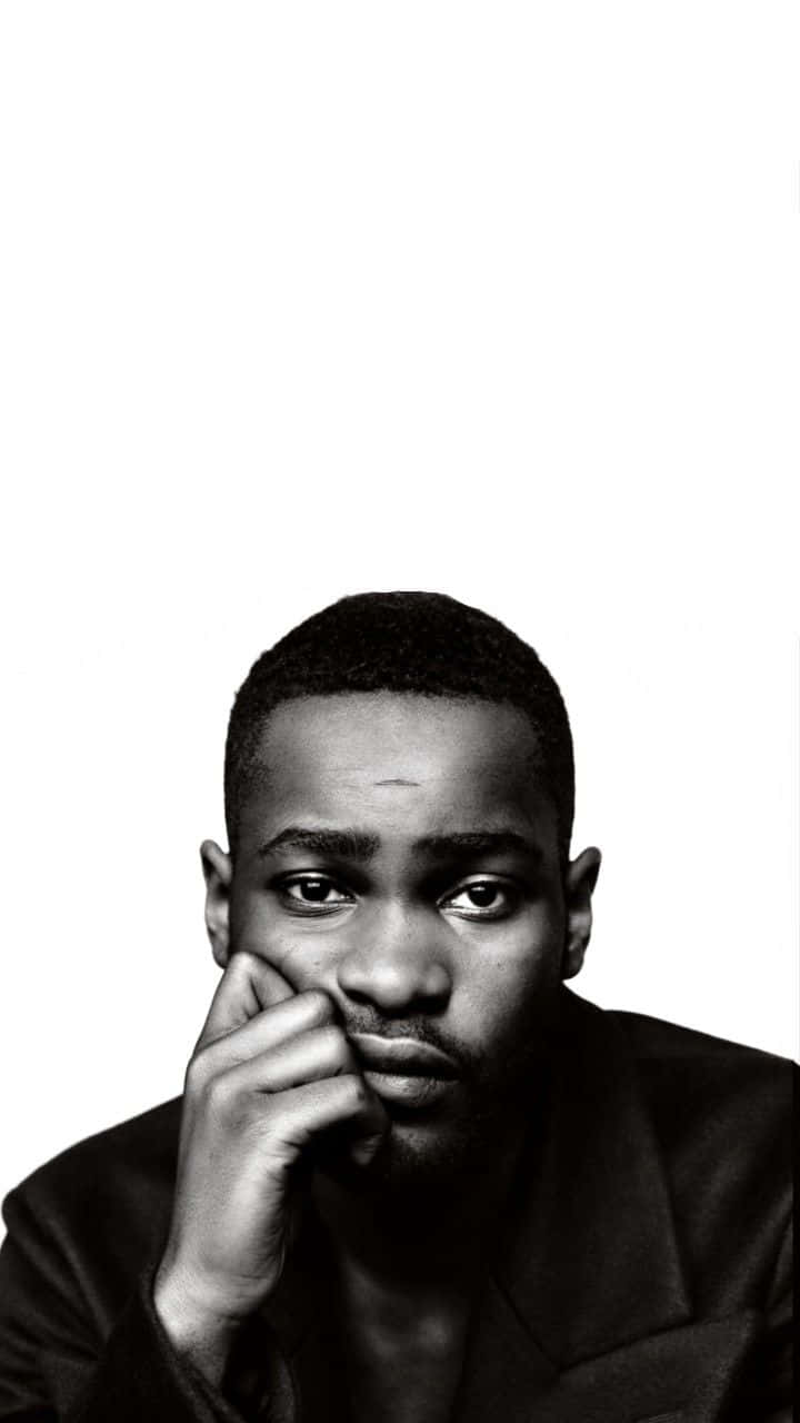 Thoughtful Man Blackand White Portrait Background