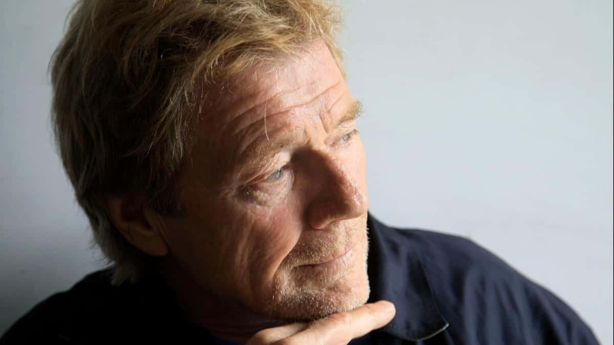 Thoughtful Man Gazing Into Distance Background