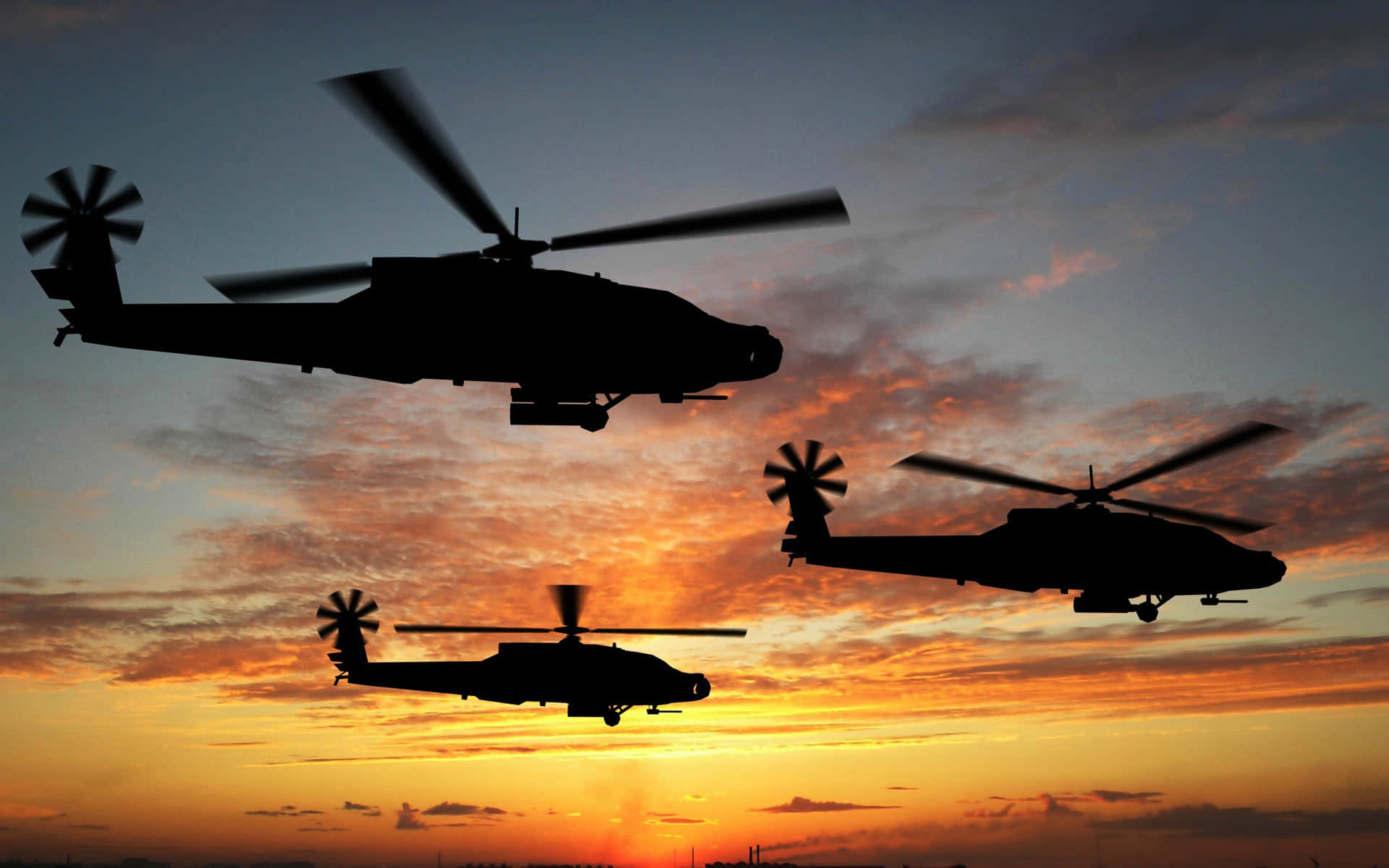 Three Boeing Ah-64 Apache Cool Helicopters
