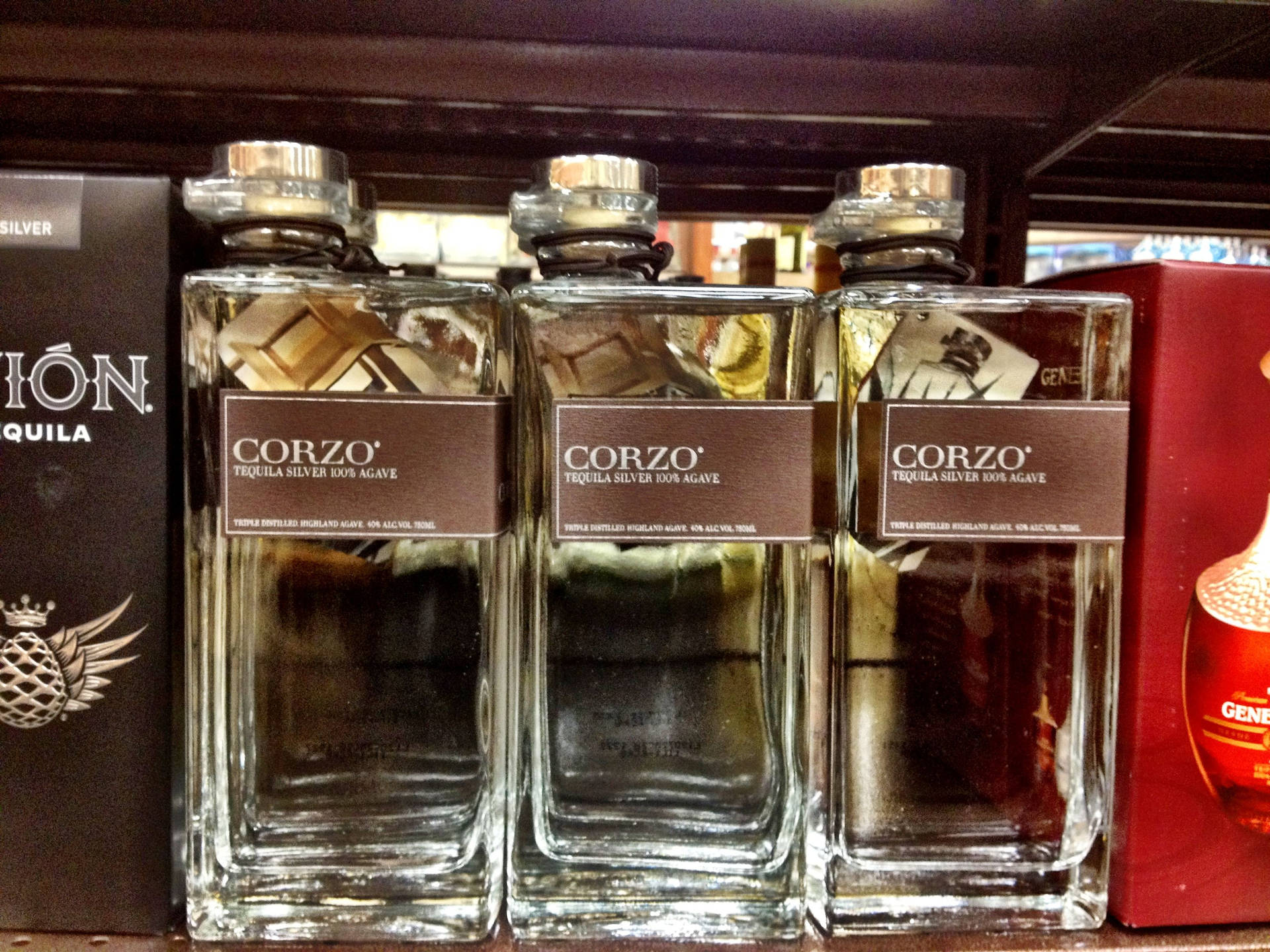 Three Bottles Of Corzo Silver Tequila Background