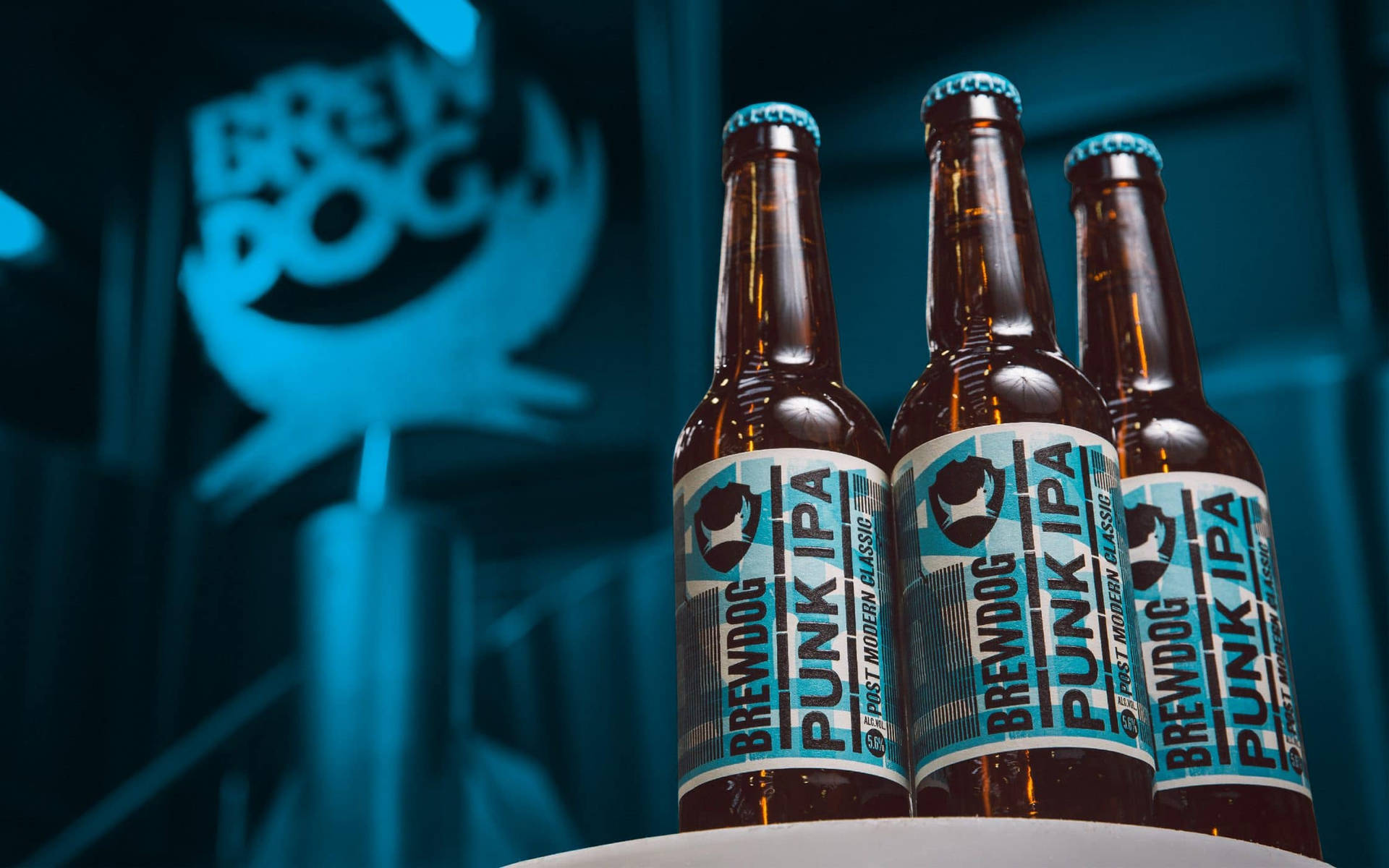 Three Brewdog Punk Ipa Bottles Background