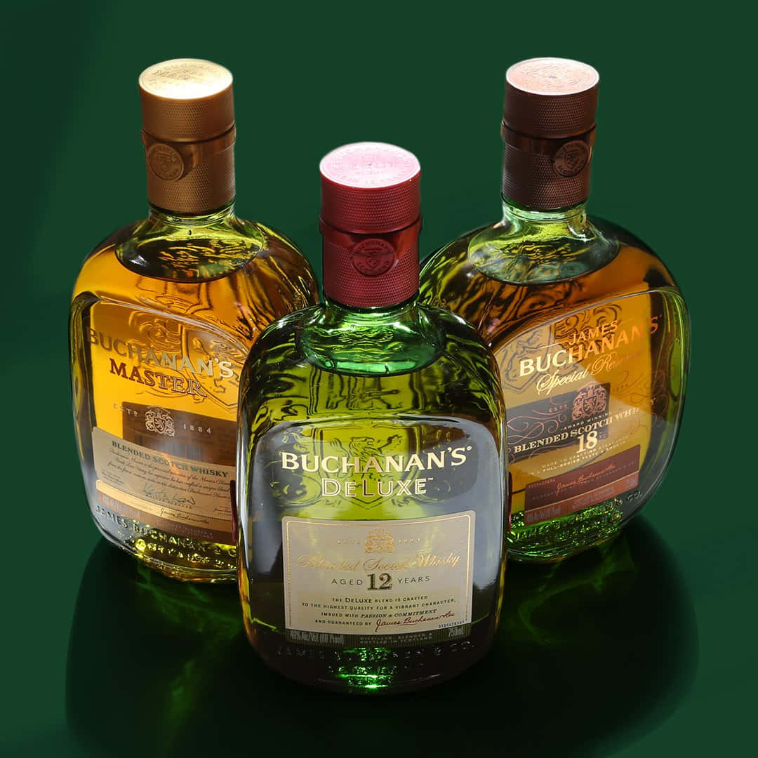 Three Buchanan's Blended Whiskey Bottles