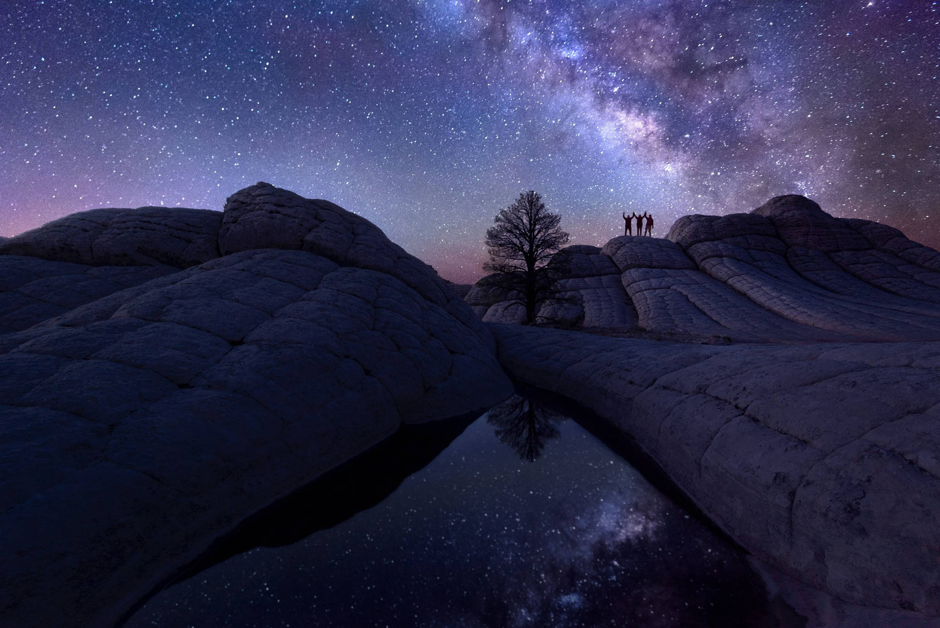 Three Friends Watching The Milky Way Background