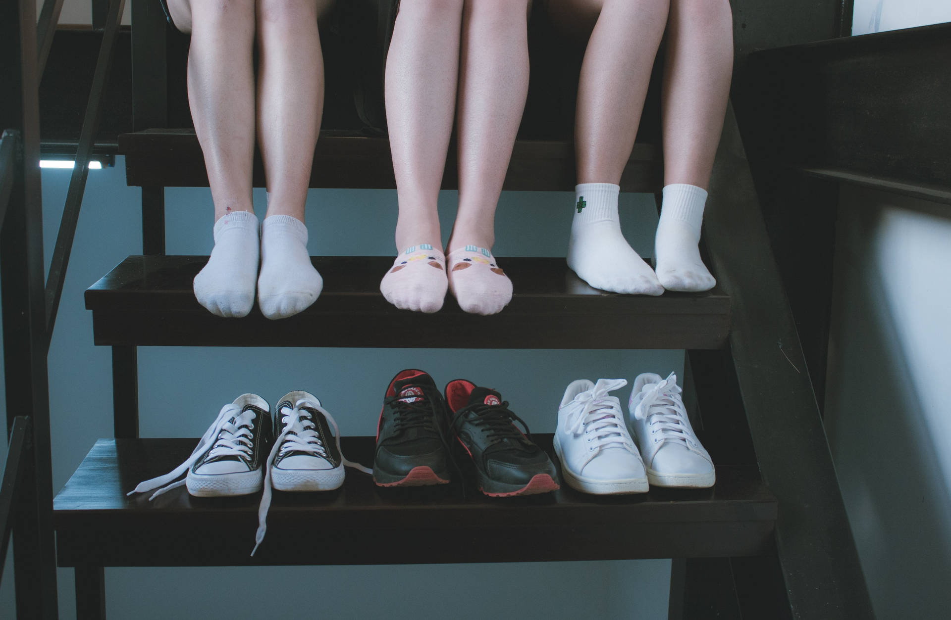 Three Friends With Shoes Background