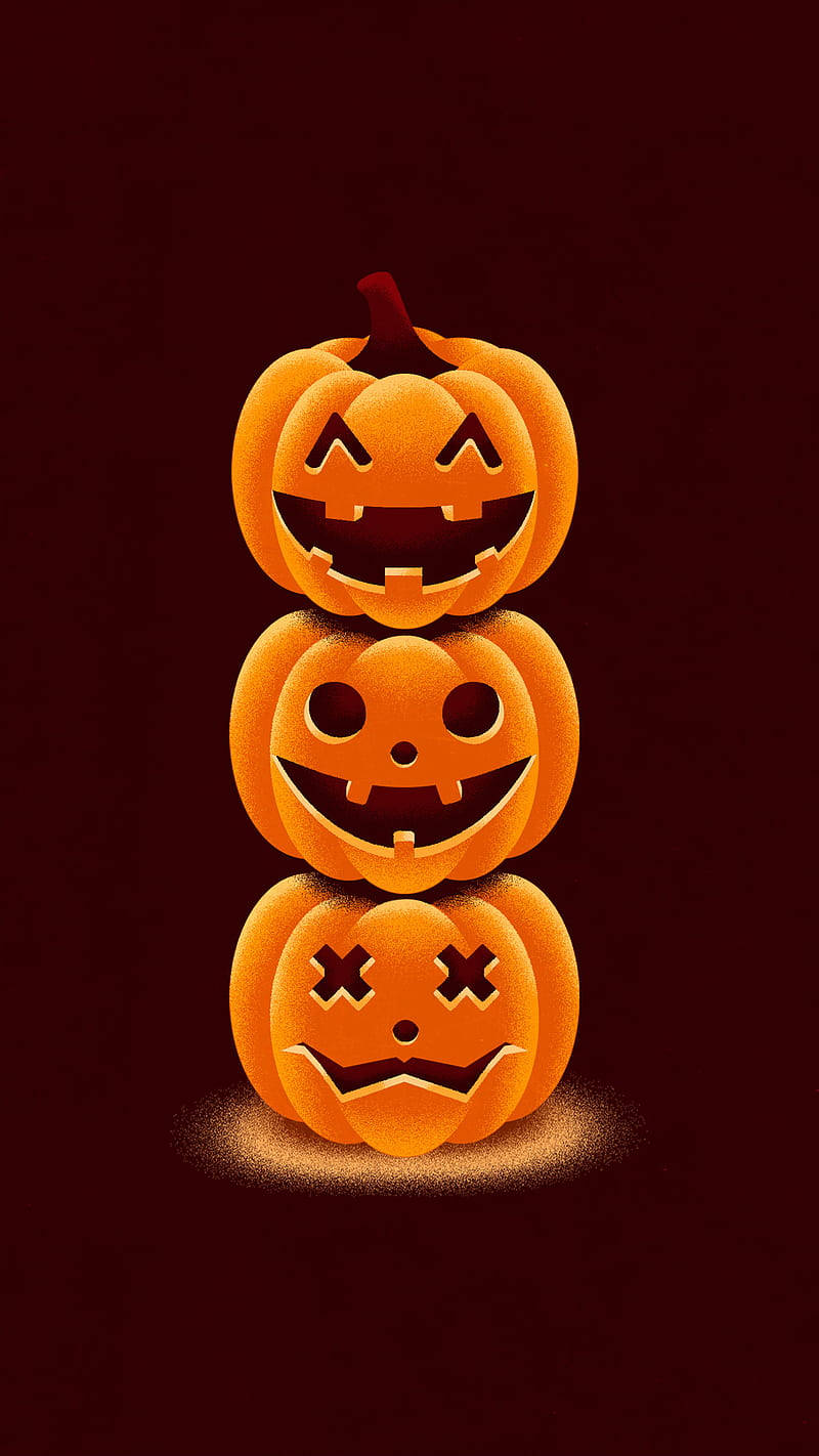 Three Halloween Pumpkin Background