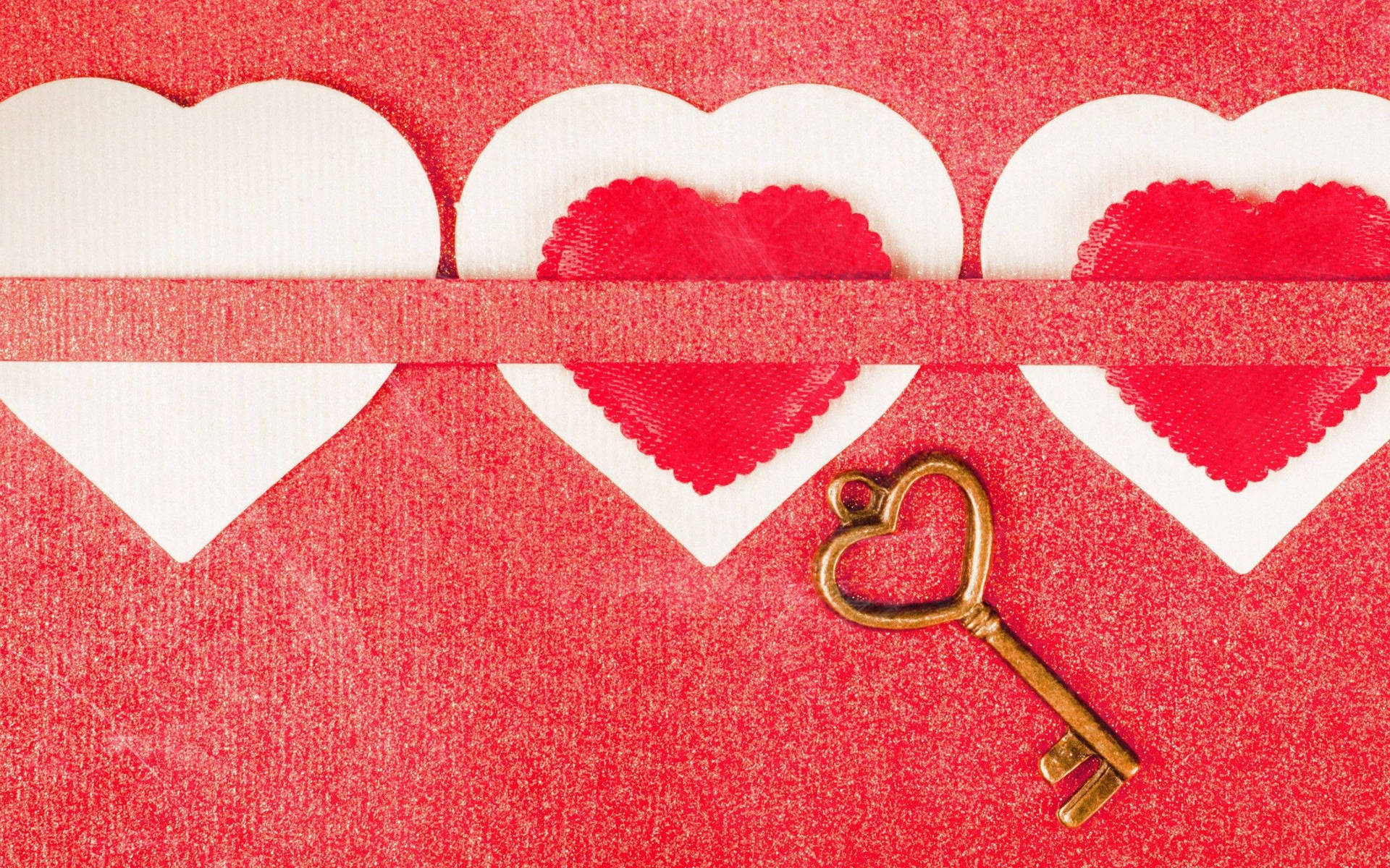 Three Hearts With A Key On A Red Background Background