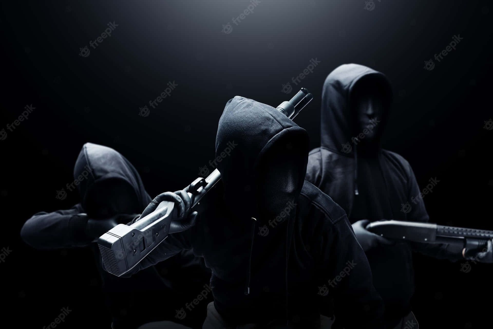 Three Hooded Men With Guns On A Dark Background Background