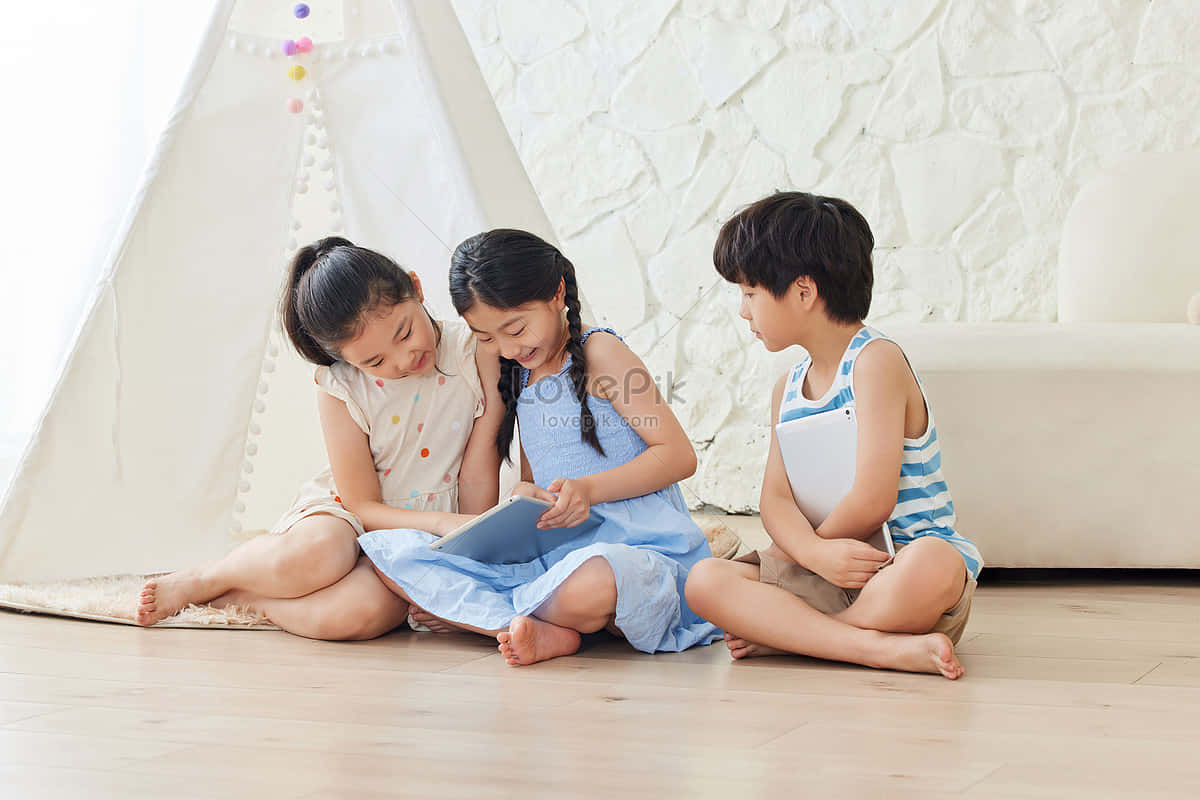 Three Kids Playing Sit Down Background