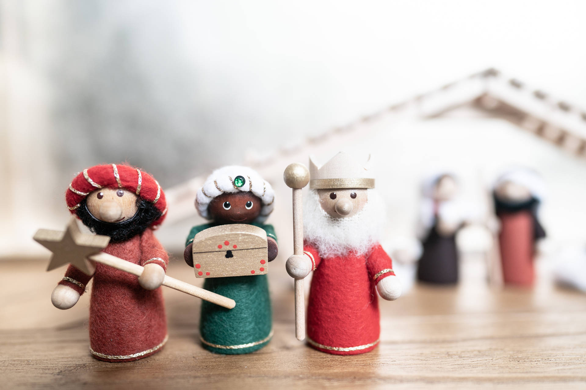 Three King Figurines Nativity Scene Background