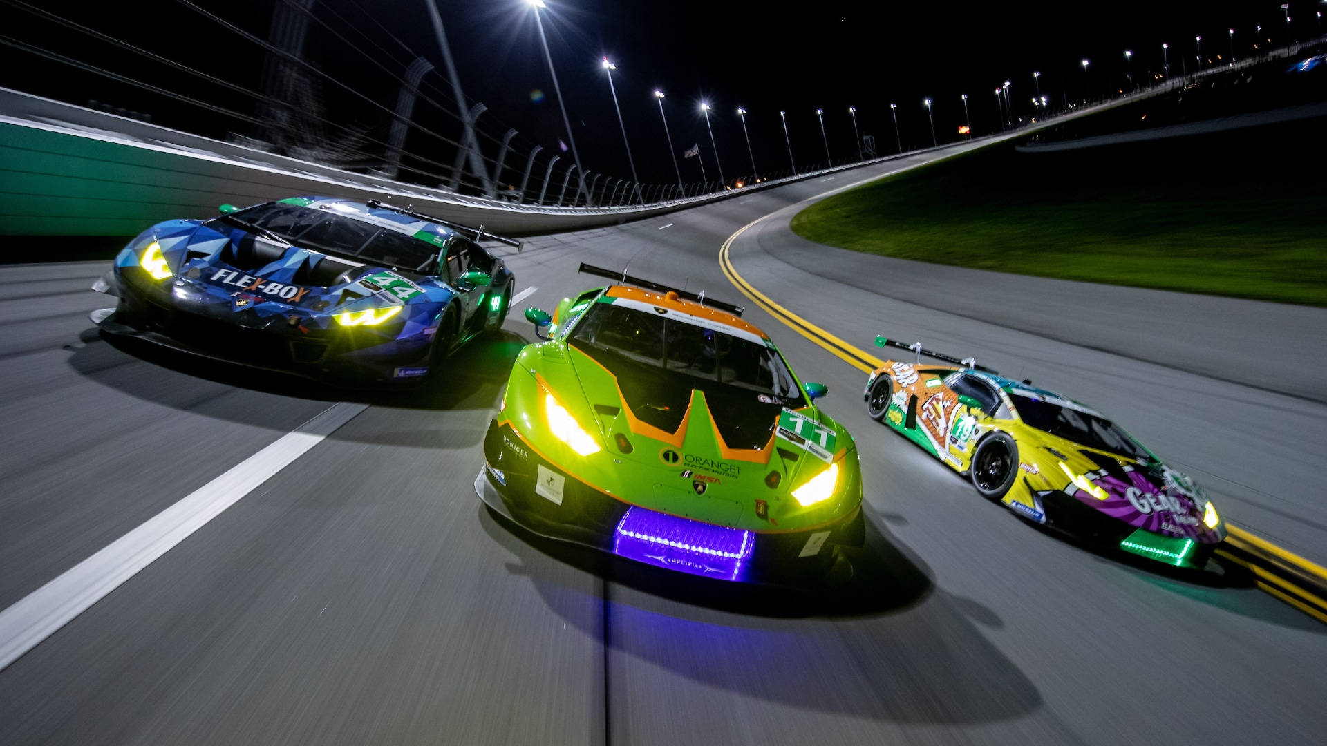 Three Lamborghini Huracán In Turn7racing Gt3 Motorsport Championship Background